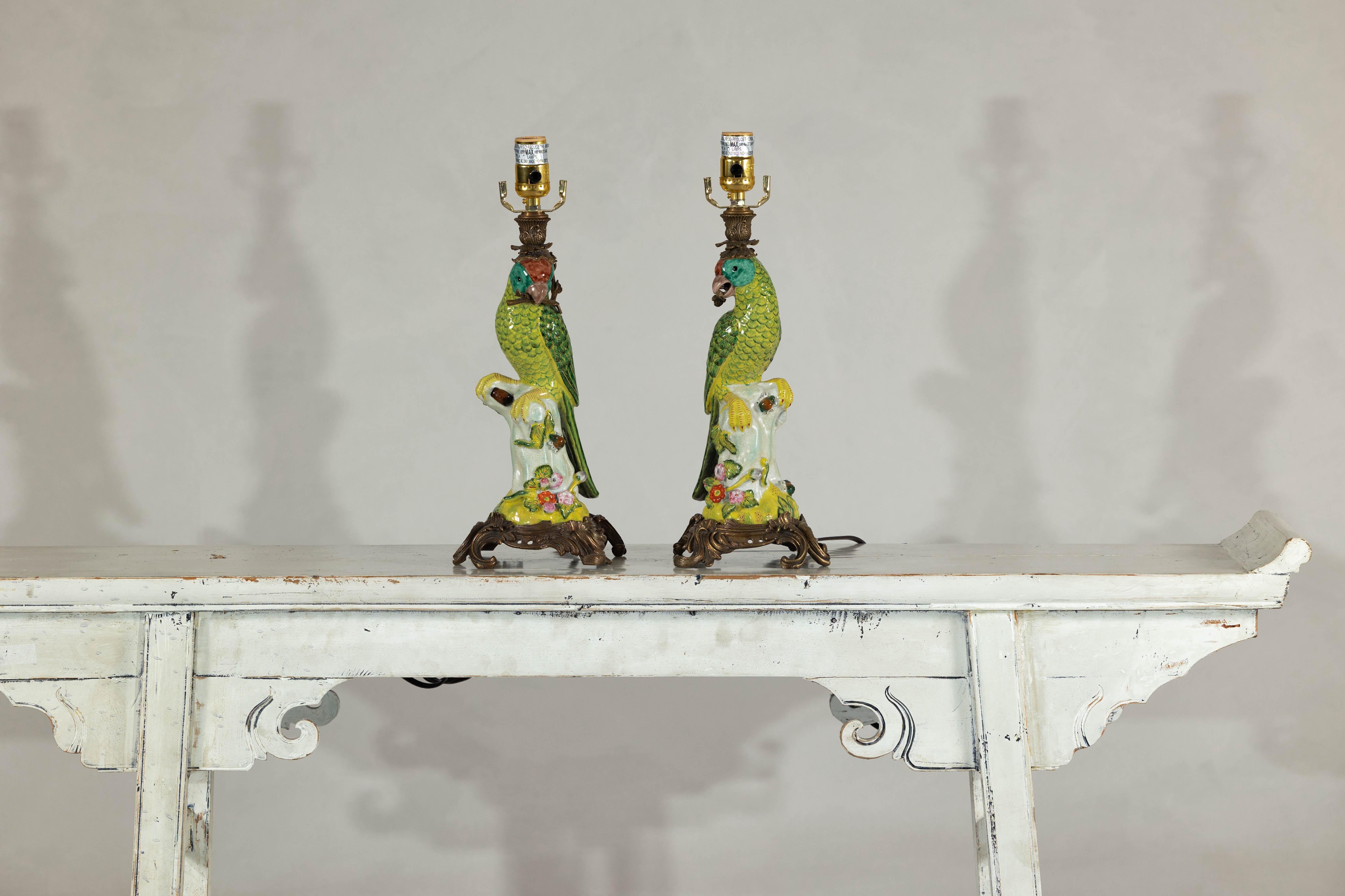 Chinese Pair of Vintage Hand-Painted Parrot Lamps on Ornate Brass Bases, Wired for USA