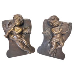 Pair of Vintage Heavy Bronze Clad Cherub Bookends