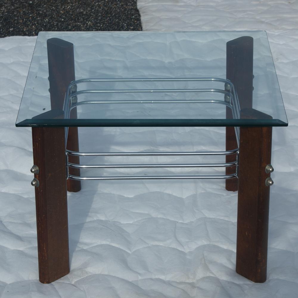 A pair of mid century modern side tables made by Heinz Meier for Landes Furniture Mfg. Co. with chrome rod and wood frames and glass tops. We have several other pieces of matching Landes furniture listed on 1stdibs as shown in the last image.