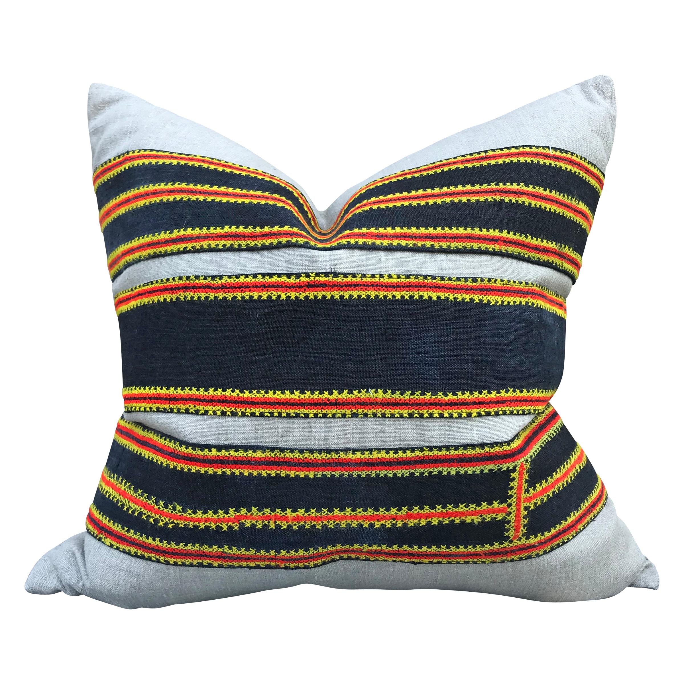 A pair of pillows made from vintage 20th century Hmong embroidered panels mounted to handwoven linen, and filled with down.