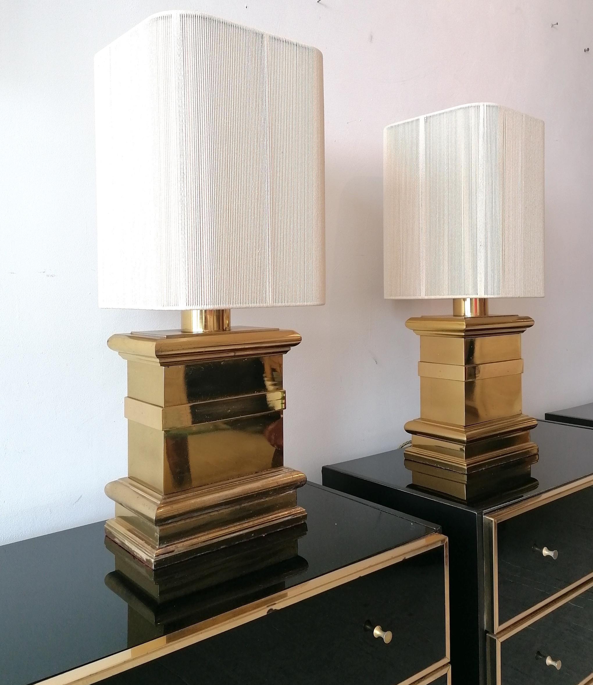20th Century Pair of  vintage Hollywood Regency James Mont style brass lamps 
