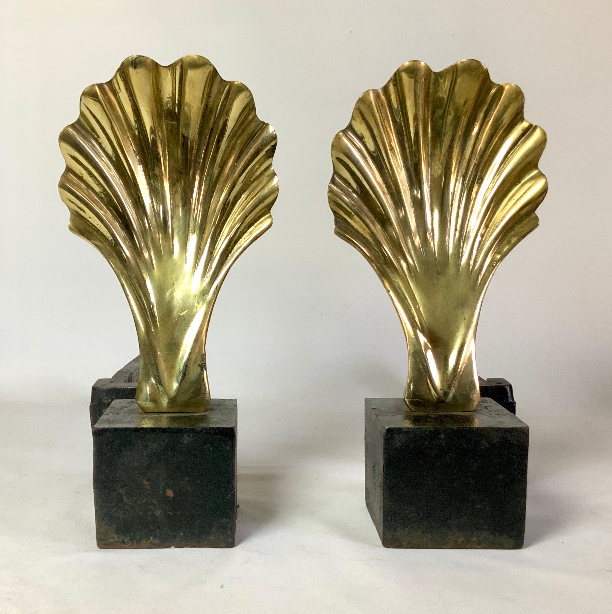 Vintage Hollywood Regency Style Brass Shell Fireplace Andirons, A Pair 

Impressive Dorothy Draper scalloped edge style. This vintage set has a wonderful appeal as apparent with shells being solid brass. This pair are very versatile and can be mixed