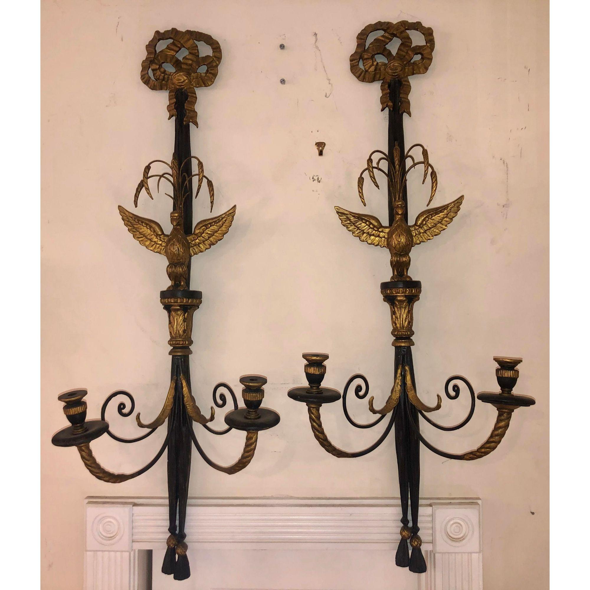 Pair of Vintage Hollywood Regency Style candelabra sconces.

Additional information: 
Materials: Giltwood
Color: Black
Period: 1950s
Place of Origin: Italy
Styles: Federal, Hollywood Regency
Item Type: Vintage, Antique or