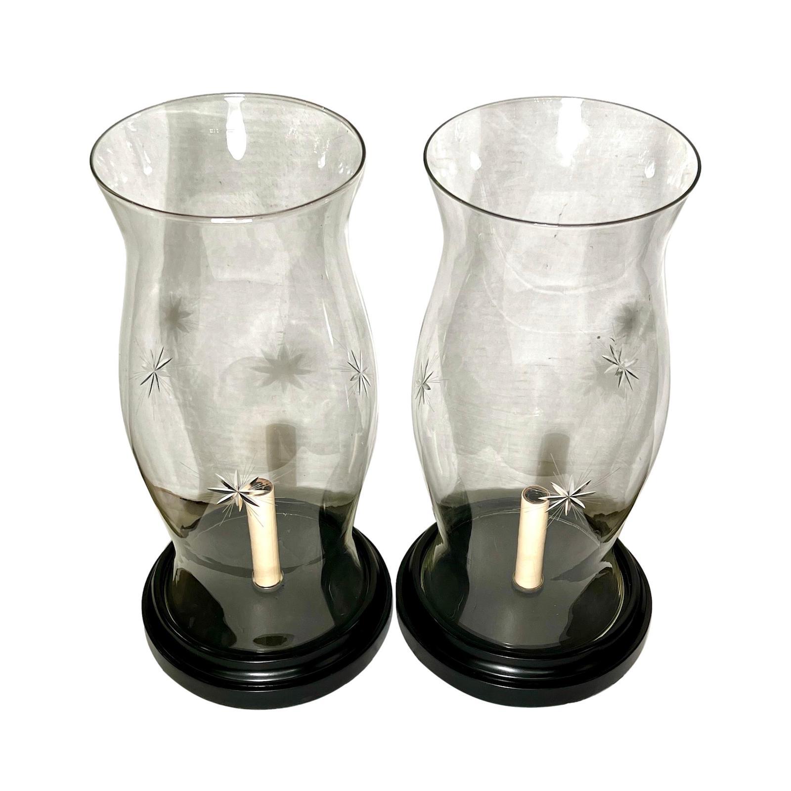 Pair of circa 1950’s English etched hurricanes lamps with single light.

Measurements:
Height: 17?
Diameter at widest: 8.5?.