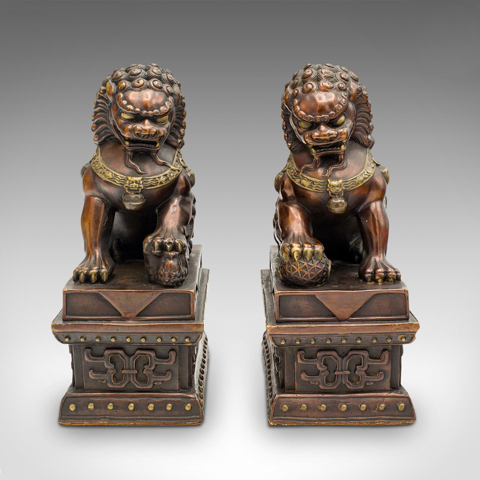 This is a pair of vintage Imperial Lion statues. A Chinese, bronze decorative ornament or bookends, dating to the late Art Deco period, circa 1940.

Exceptional bronze patination to this delightful pair of lions
Displaying a desirable aged patina