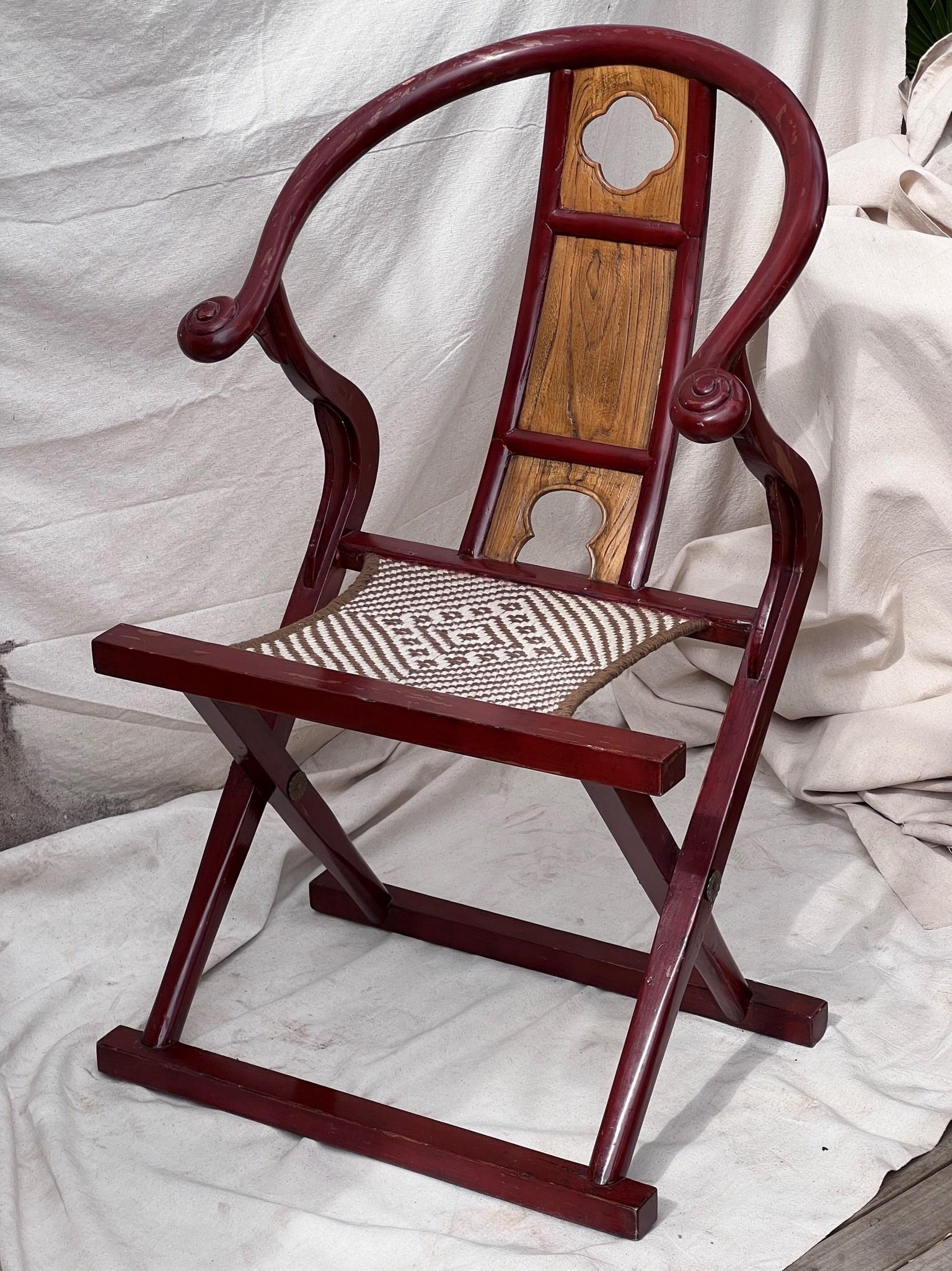Introducing the 19th-century Vintage in the Style of Chinese Horseshoe Wooden Folding Chairs. Chinese Horseshoe Chairs initially crafted as seats of distinction, were exclusively reserved for individuals of paramount importance and courtly