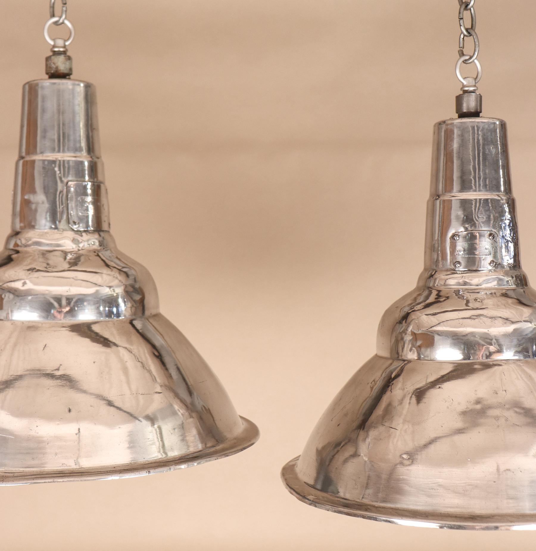Unknown Pair of Vintage Industrial Aluminum Floodlight Pendants