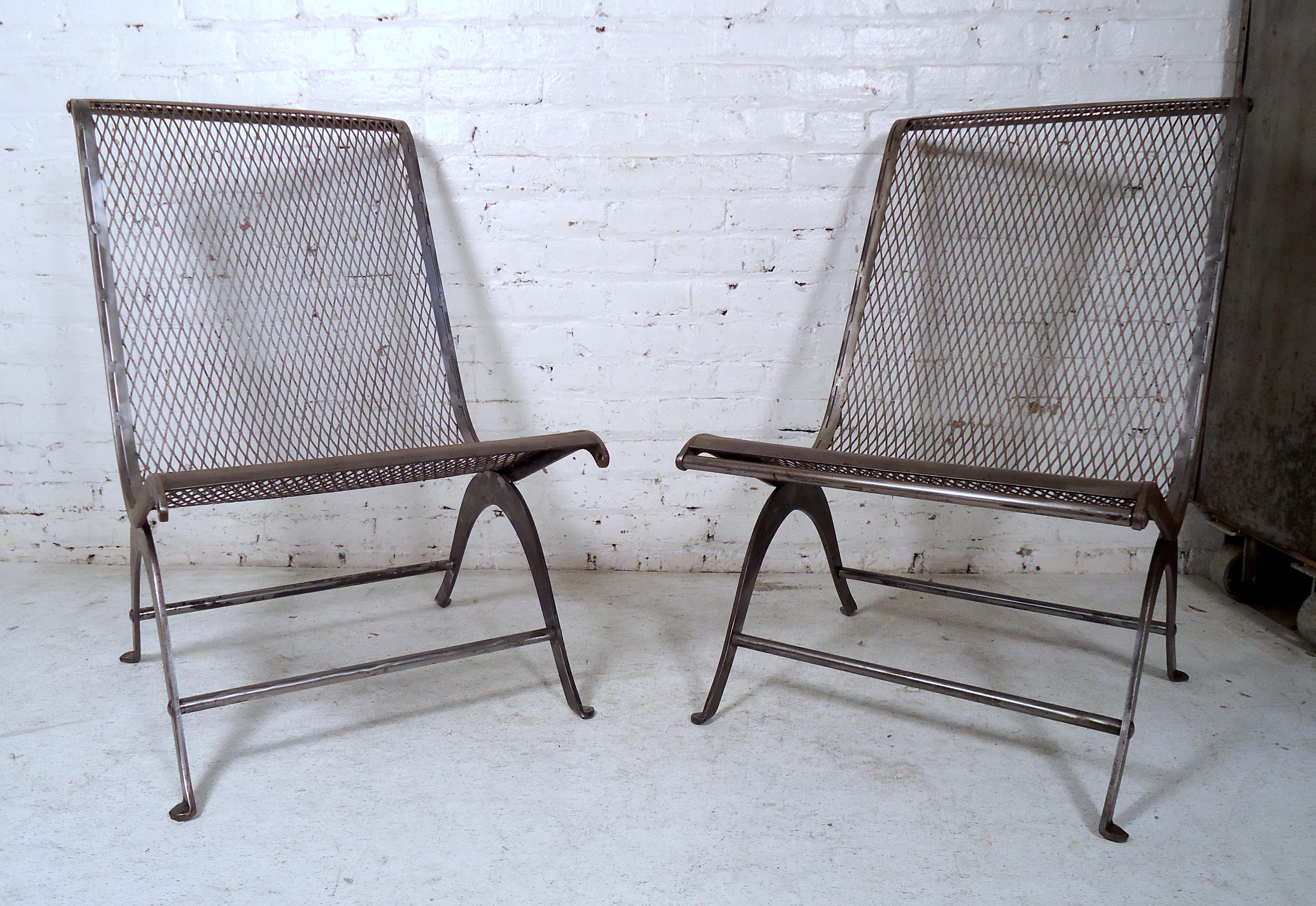 Gorgeous pair of Industrial metal chairs featured in a bare metal finish.

(Please confirm item location - NY or NJ with dealer).
