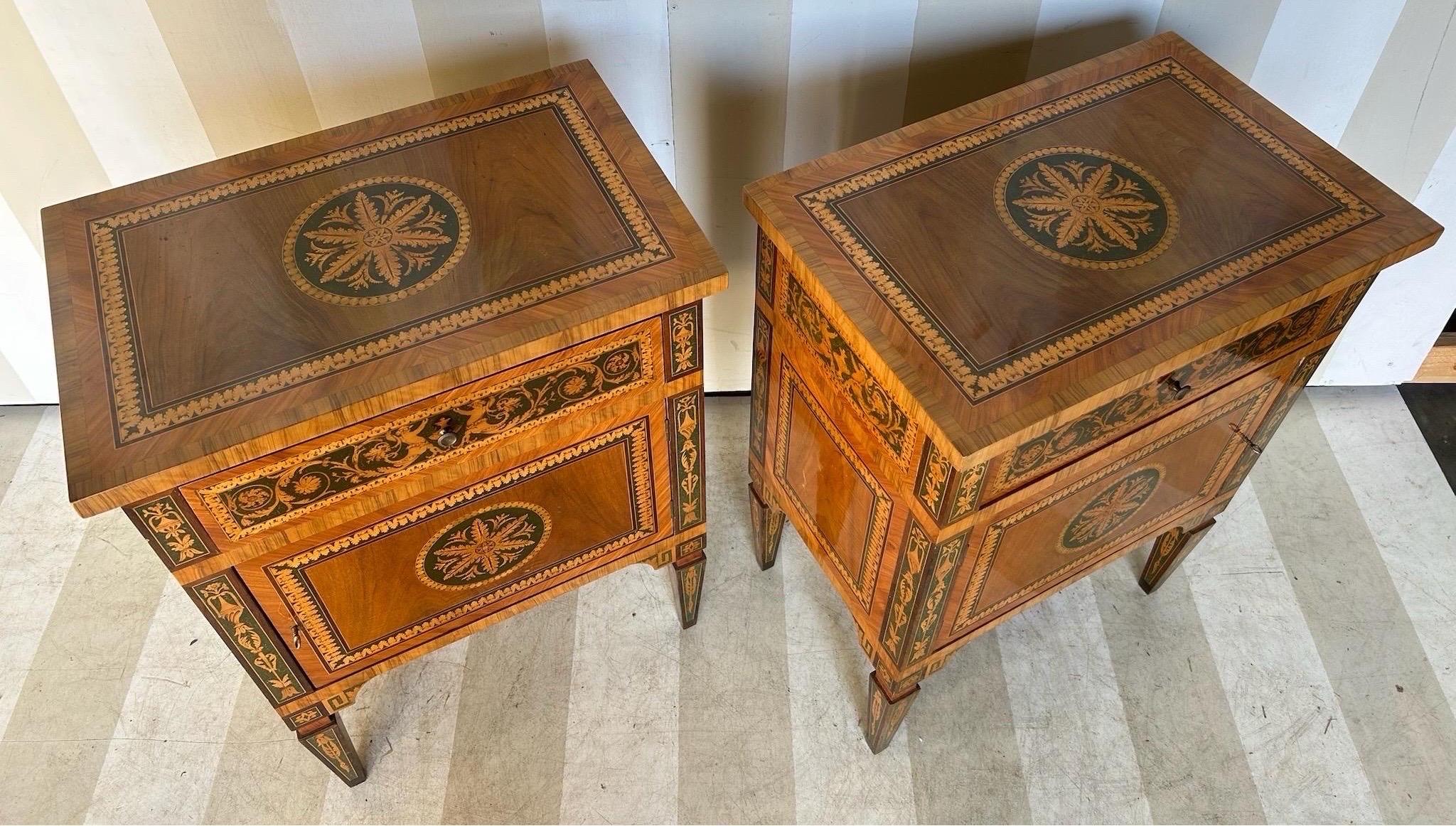 Great looking pair of heavily inlaid vintage Italian commodinis. Would be great as side tables, end tables or bedside tables 