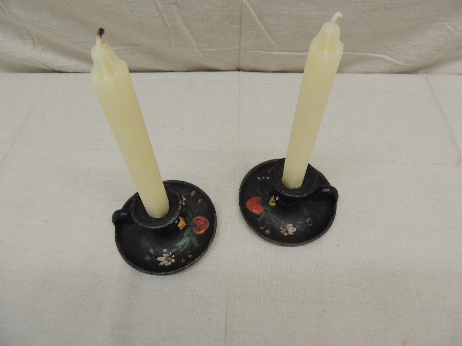 Pair of vintage iron hand painted candleholders.
Round Folk Art candleholders painted with hearts and flowers.
Size: 4