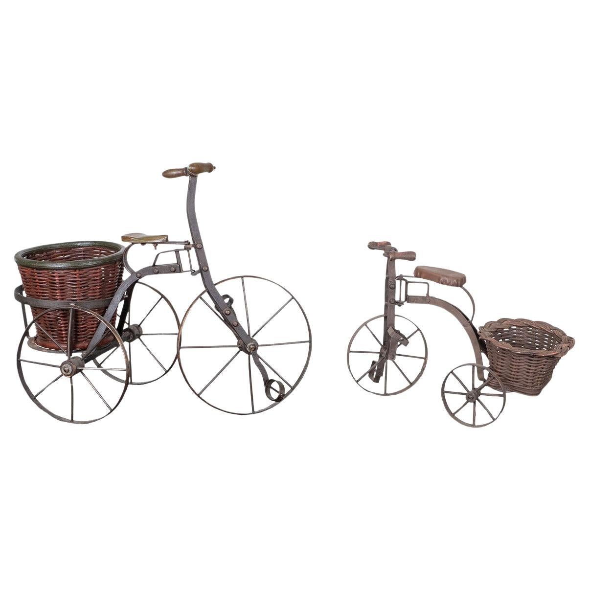 Pair of vintage iron tricycle sculptures For Sale