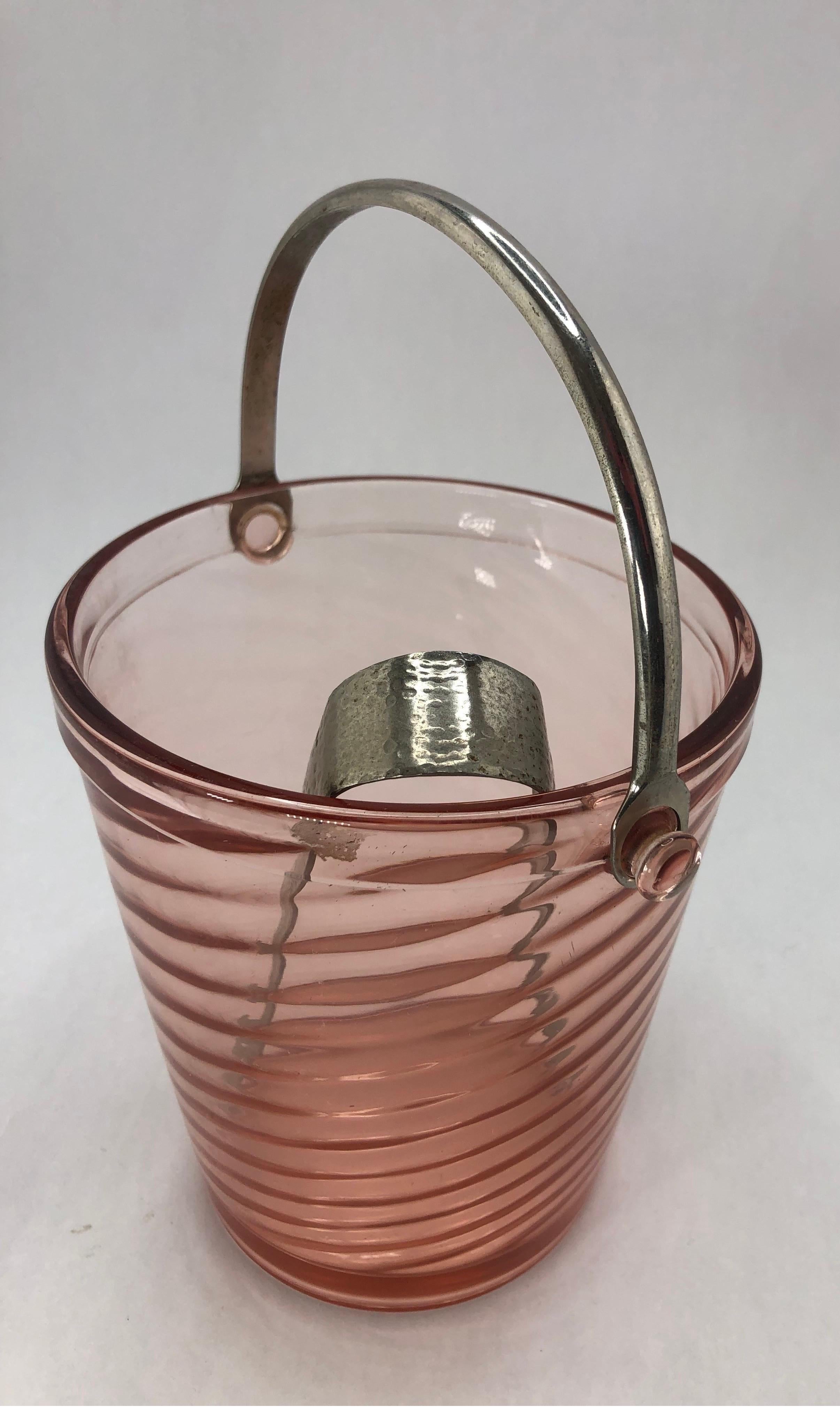 Art Deco Pink Glass Ice Bucket with chrome handle and ice tongs.