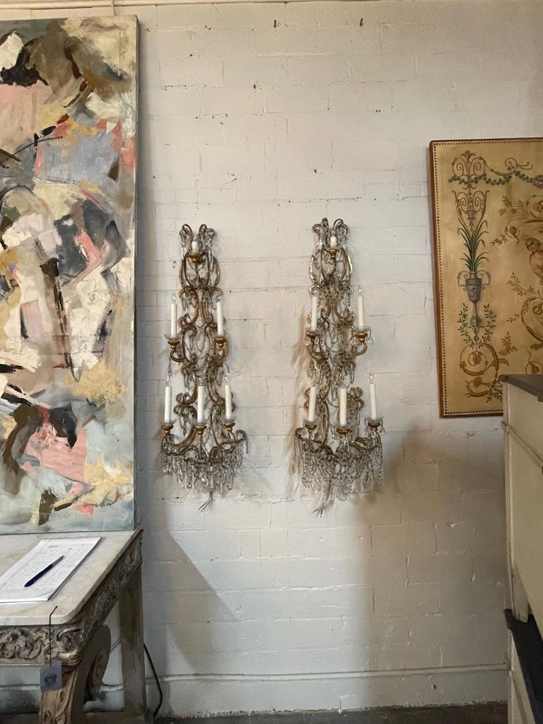 Elegant pair of Vintage Italian beaded crystal 6 light wall sconces. These are very large scale with beautiful crystals and 5 lights. Very impressive!
