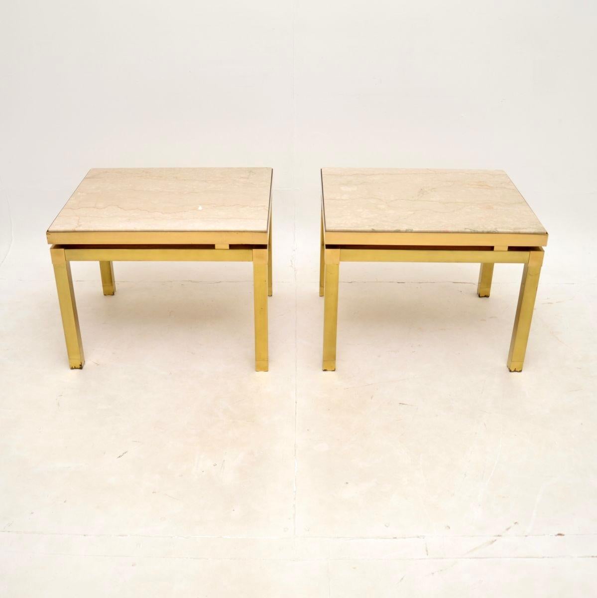 A stunning pair of vintage Italian brass and marble side tables, dating from the 1970’s.

They are of outstanding quality, the solid bras frames are heavy and very well made. They are beautifully styled and have inset cream marble tops that can be