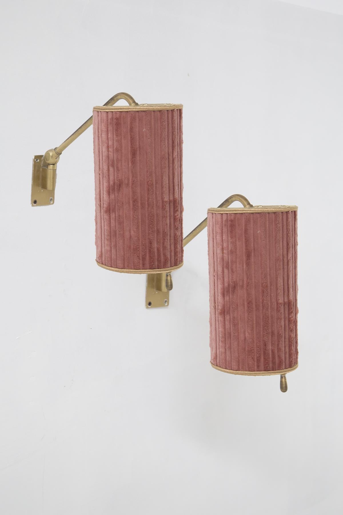 Step into a world of timeless elegance with this exquisite pair of vintage wall lamps, crafted by the skilled hands of Italian artisans during the 20th century. These luminous treasures are more than just lighting fixtures; they are a testament to