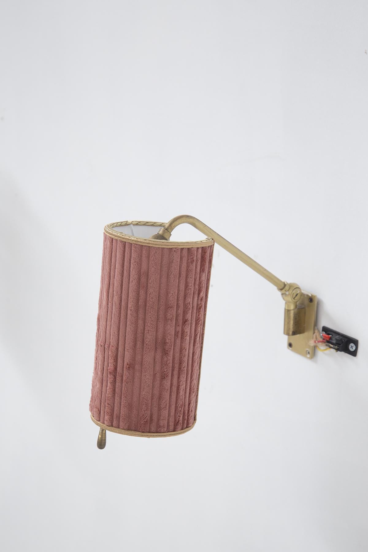 Mid-Century Modern Pair of vintage Italian brass and pink velvet wall lamps For Sale
