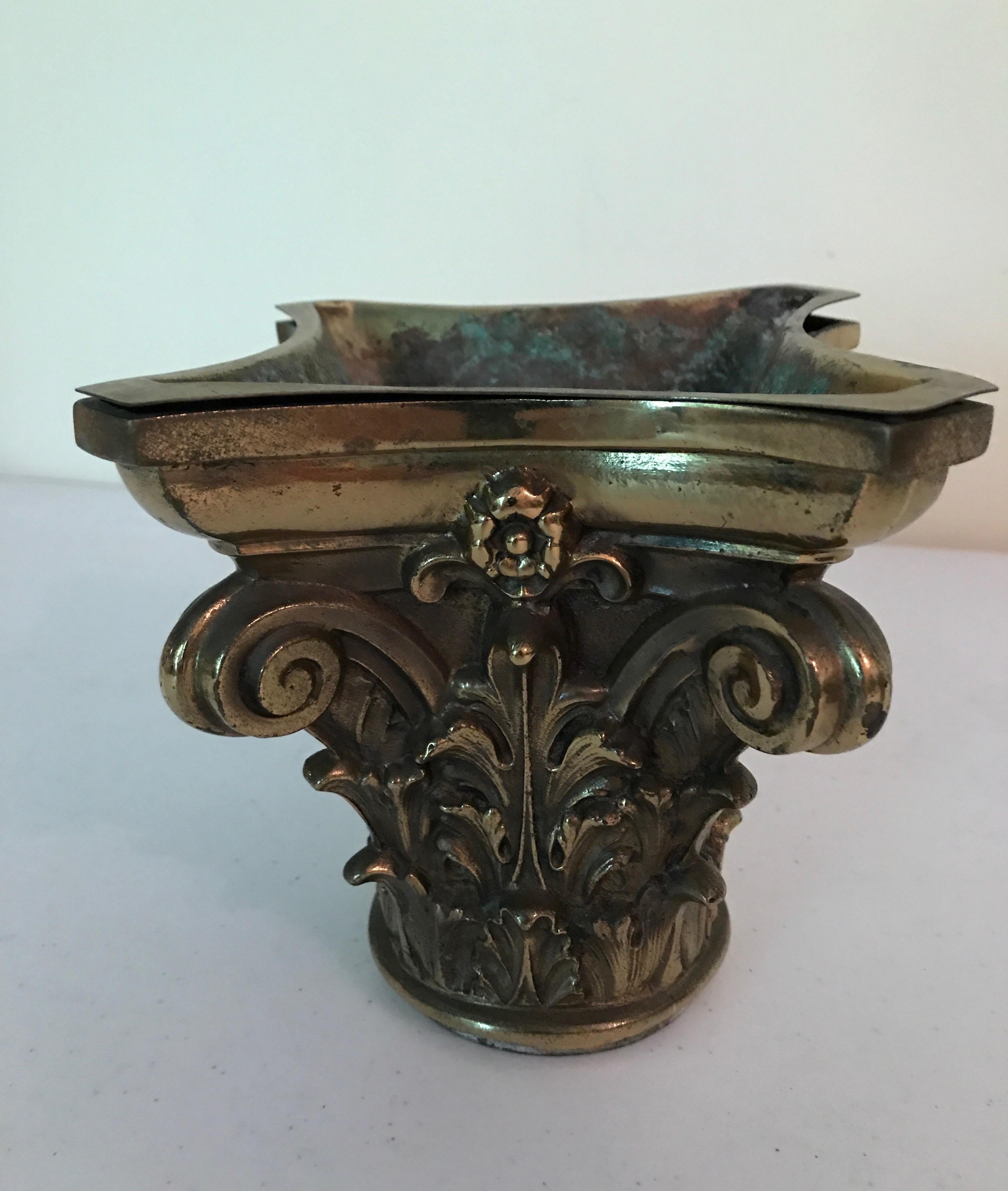 Neoclassical style brass corbel cache pots with liners.