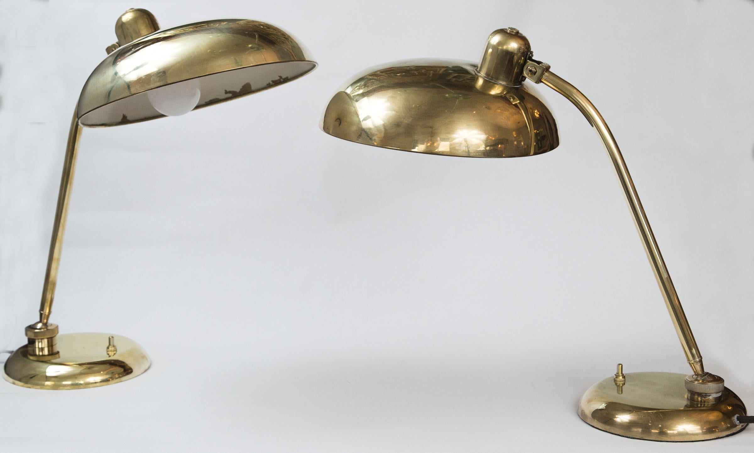 Handsome pair of Italian vintage unlacquered brass lamps with rotating arm and shade attributed to Arredoluce
Origin: Italy
Period: circa 1940-1950
Dimensions: 11? diameter, 18? high
Condition: Excellent, prior to acquiring in original