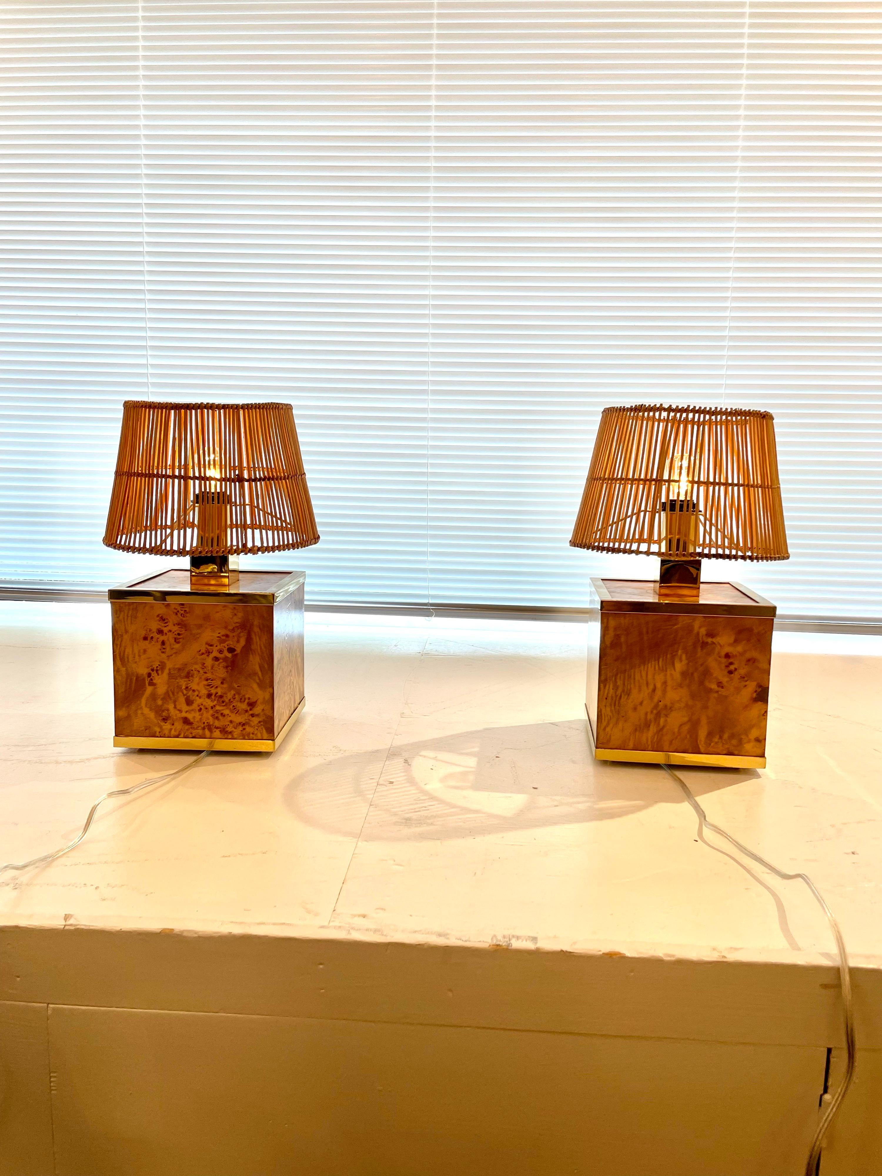 Topped with custom straw shades (included), these vintage Romeo Rega lamps are a burl wood box with brass trim and accents.