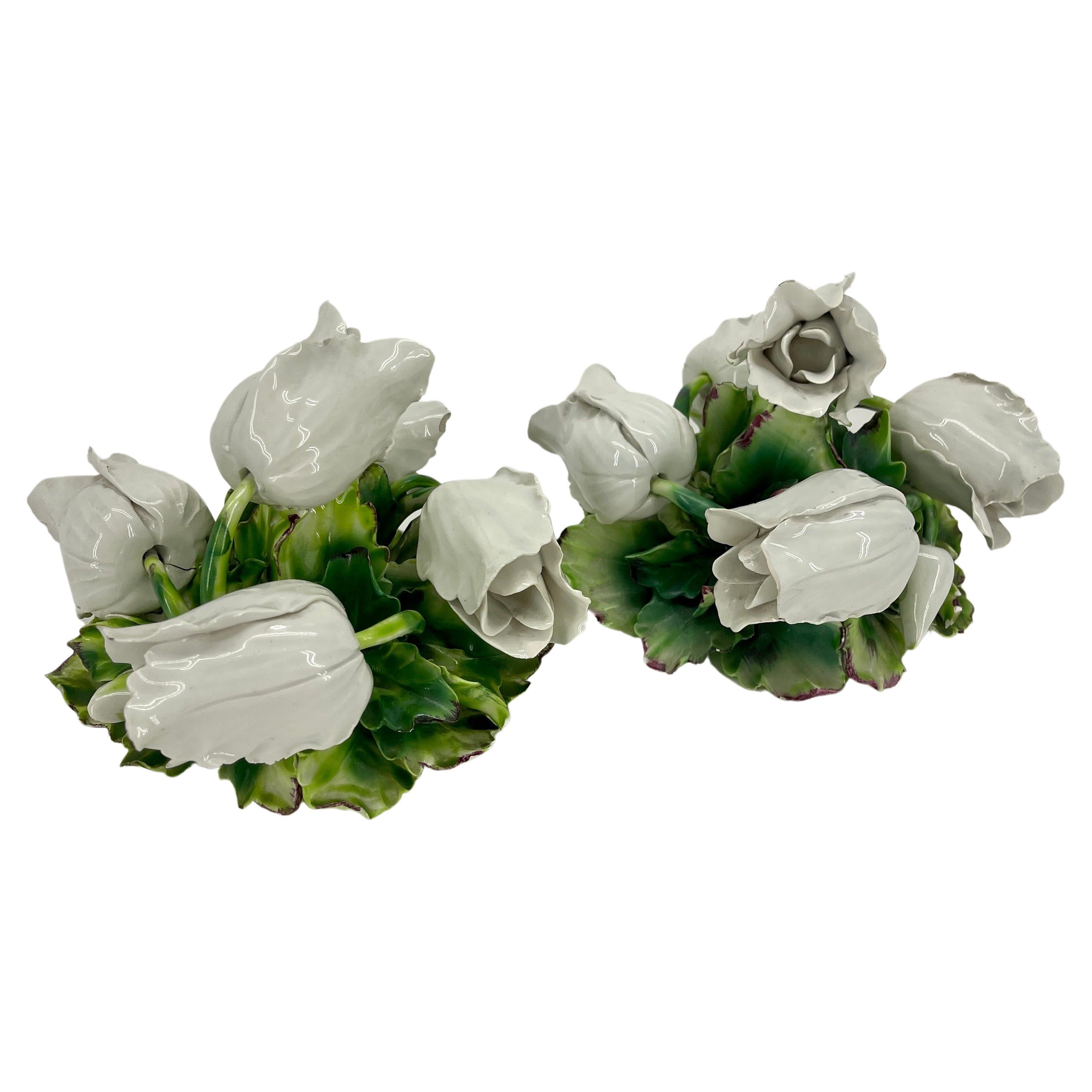 Vintage Pair of Ceramic Tulip Centerpieces, Italy 

These charming hand-painted Italian ceramic sculptures feature an arrangement of white tulips among green foliage. The intricate petals are delicate and very decorative. This pair would be lovely