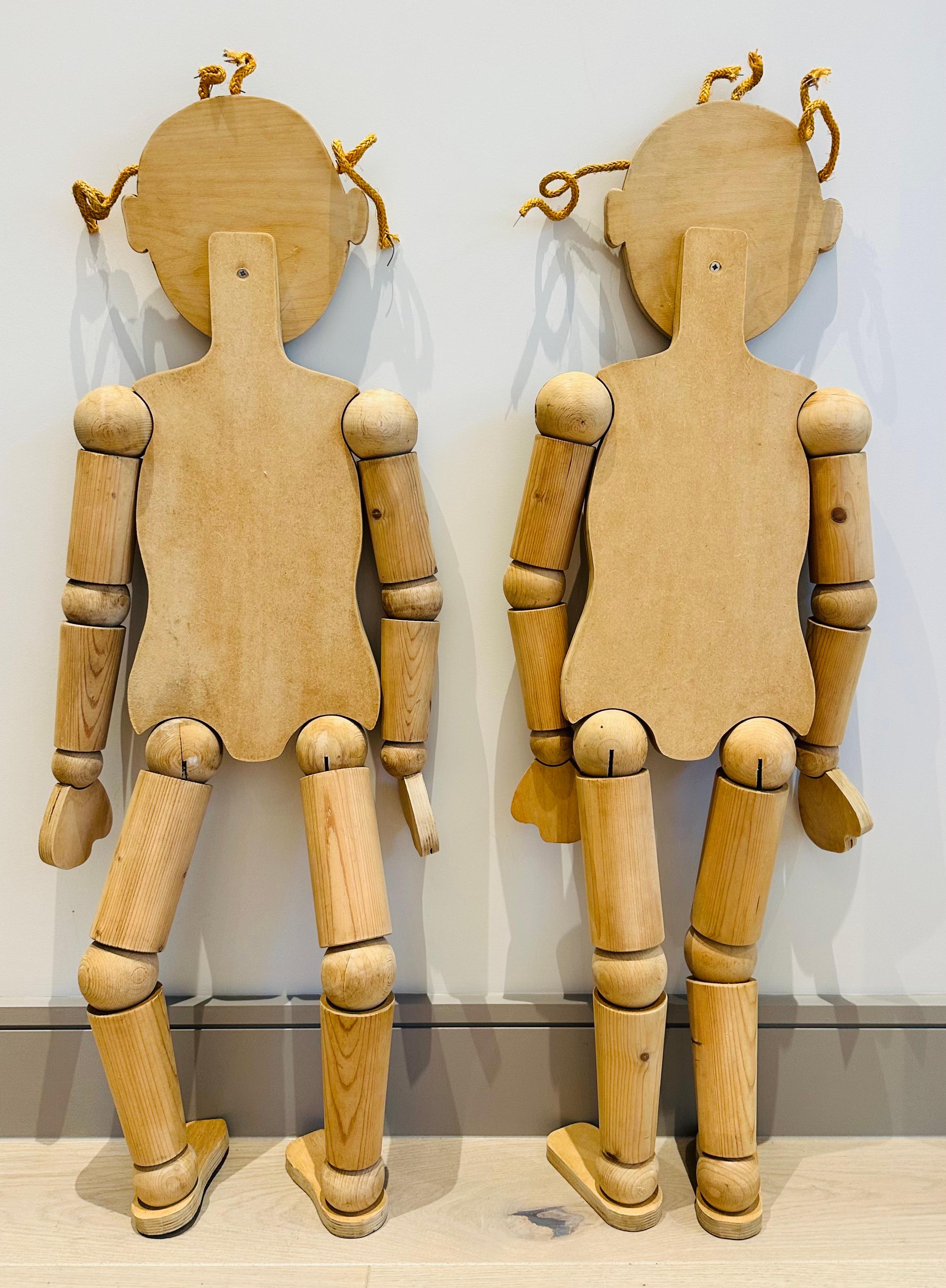 small wooden mannequin