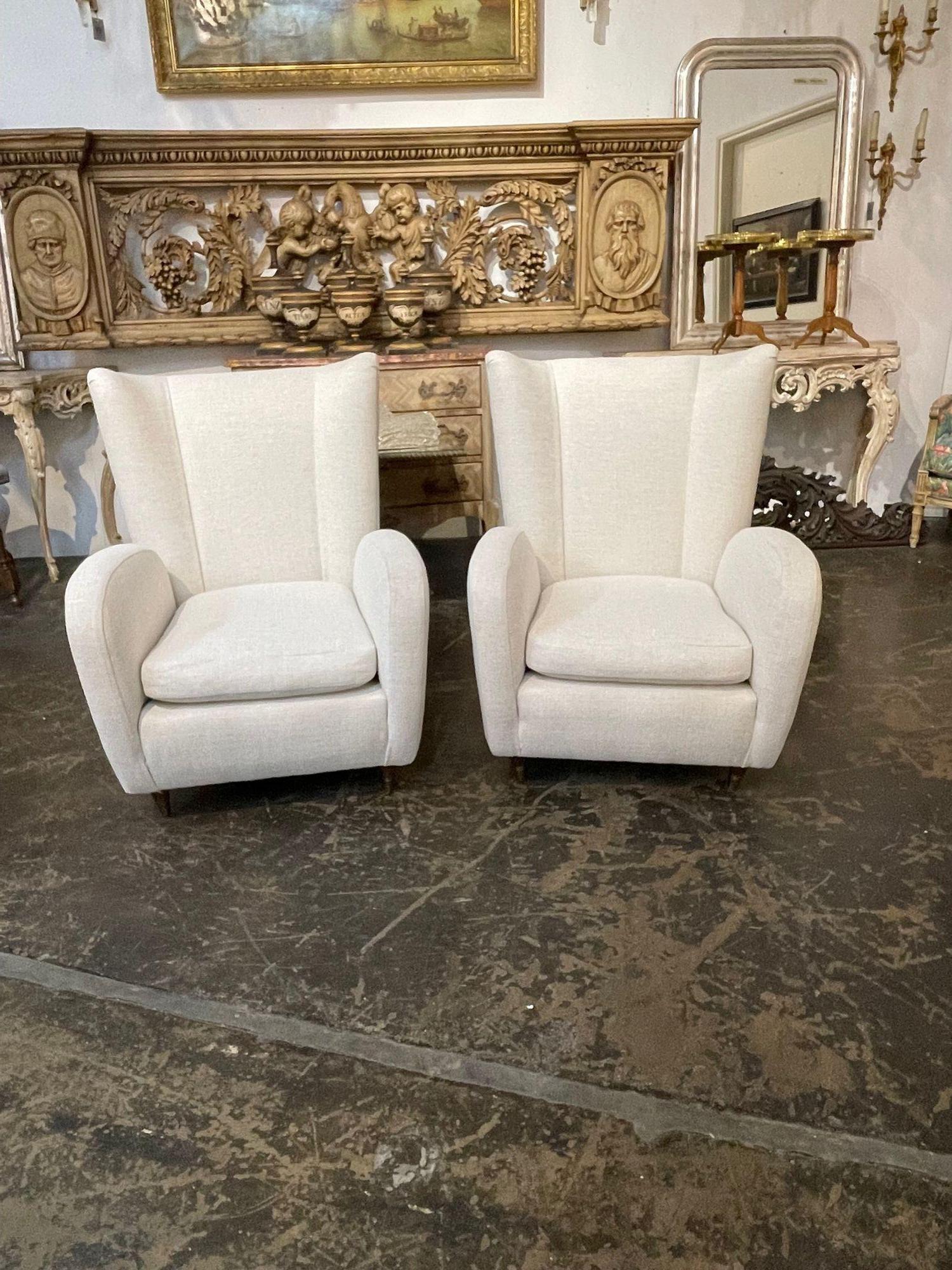 Lovely pair of vintage Italian club chairs. Creates a very stylish look. Note: The upholstery is new.