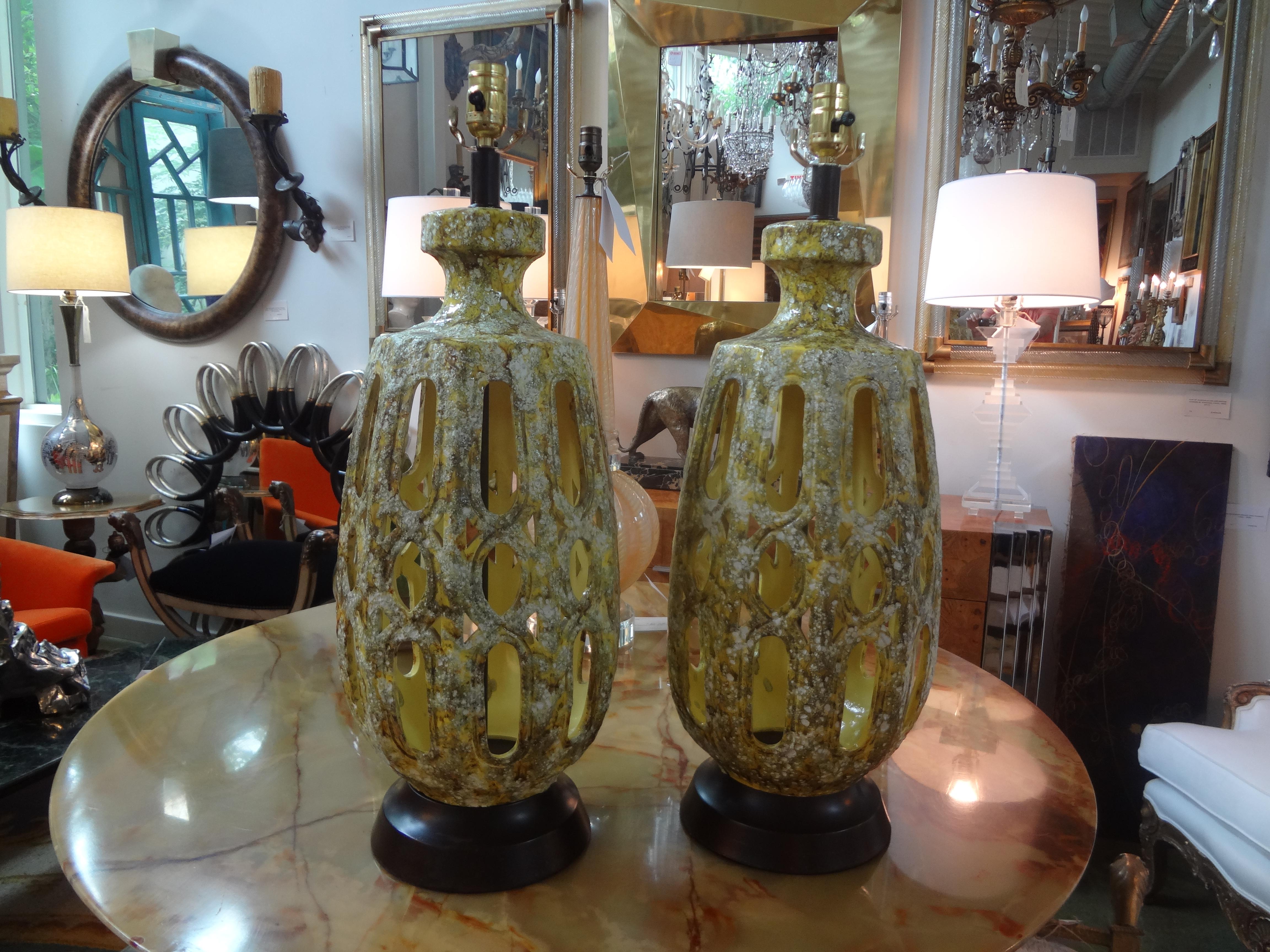 Great pair of midcentury Italian drip glaze pottery lamps. These Italian table lamps, attributed to Marbro, have been newly wired for the U.S. Market. These Hollywood Regency lamps would work well on a credenza, nightstands, console or commode.