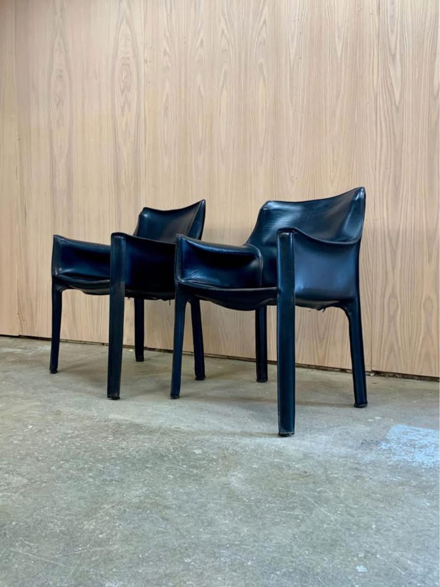 This stunning pair of vintage Mario Bellini 413 CAB chairs exudes timeless elegance and exceptional craftsmanship. Designed in 1977, the CAB chair was Bellini’s groundbreaking exploration of leather as a structural element, making it a modern design