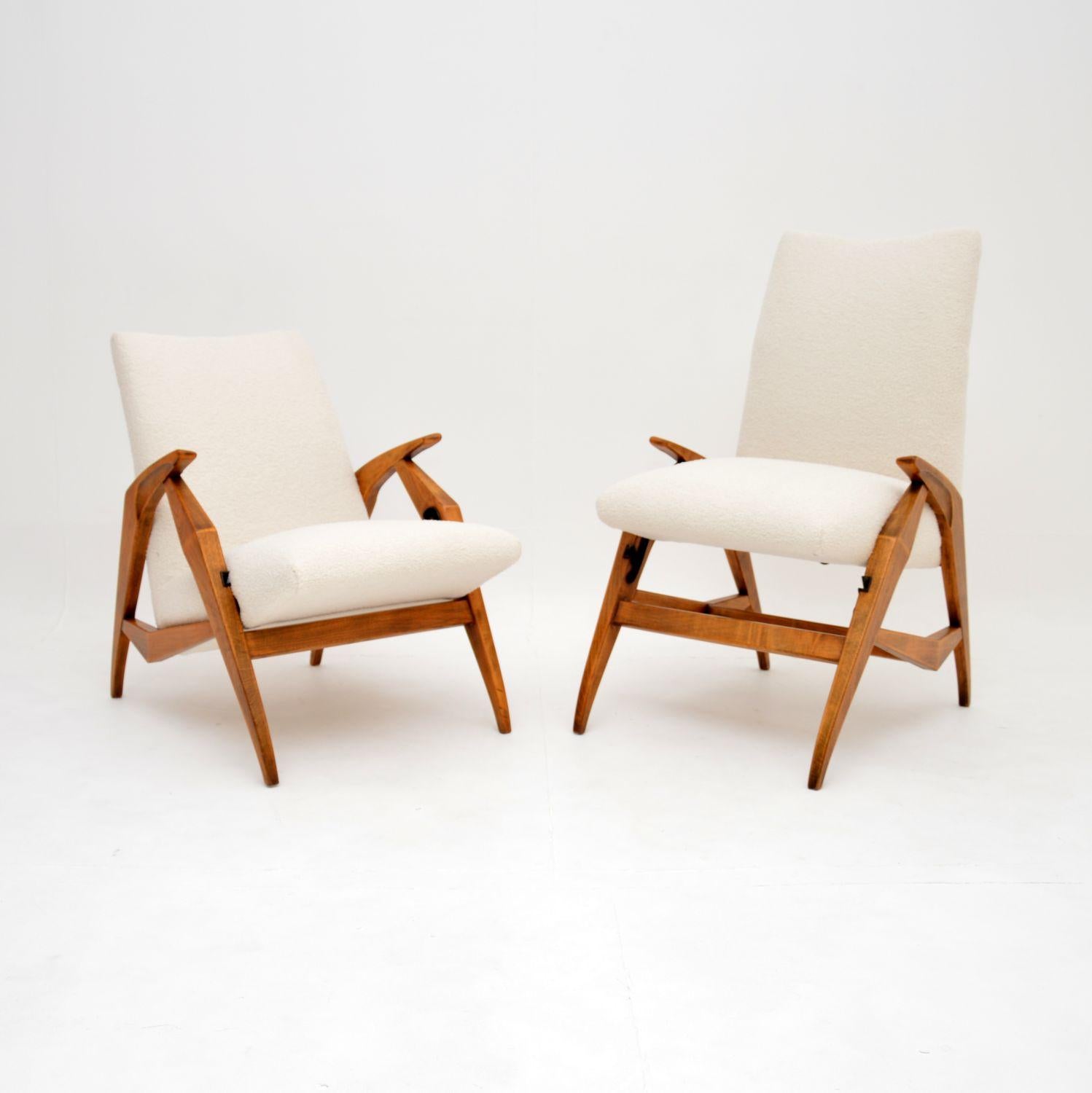 A beautiful and highly unusual pair of metamorphic armchairs that can convert from lounge chair height to dining chair height. They were made in Italy, they date from the 1960’s.

The quality is outstanding, they have an incredibly stylish and