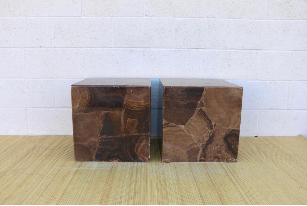 Spectacular pair of vintage cube pedestal or end tables made in Italy, both of them have a label in the interior side, you can see it in the photos. Also, they were manufactured in the 1970’s. They have been done in onyx. None of them have broken