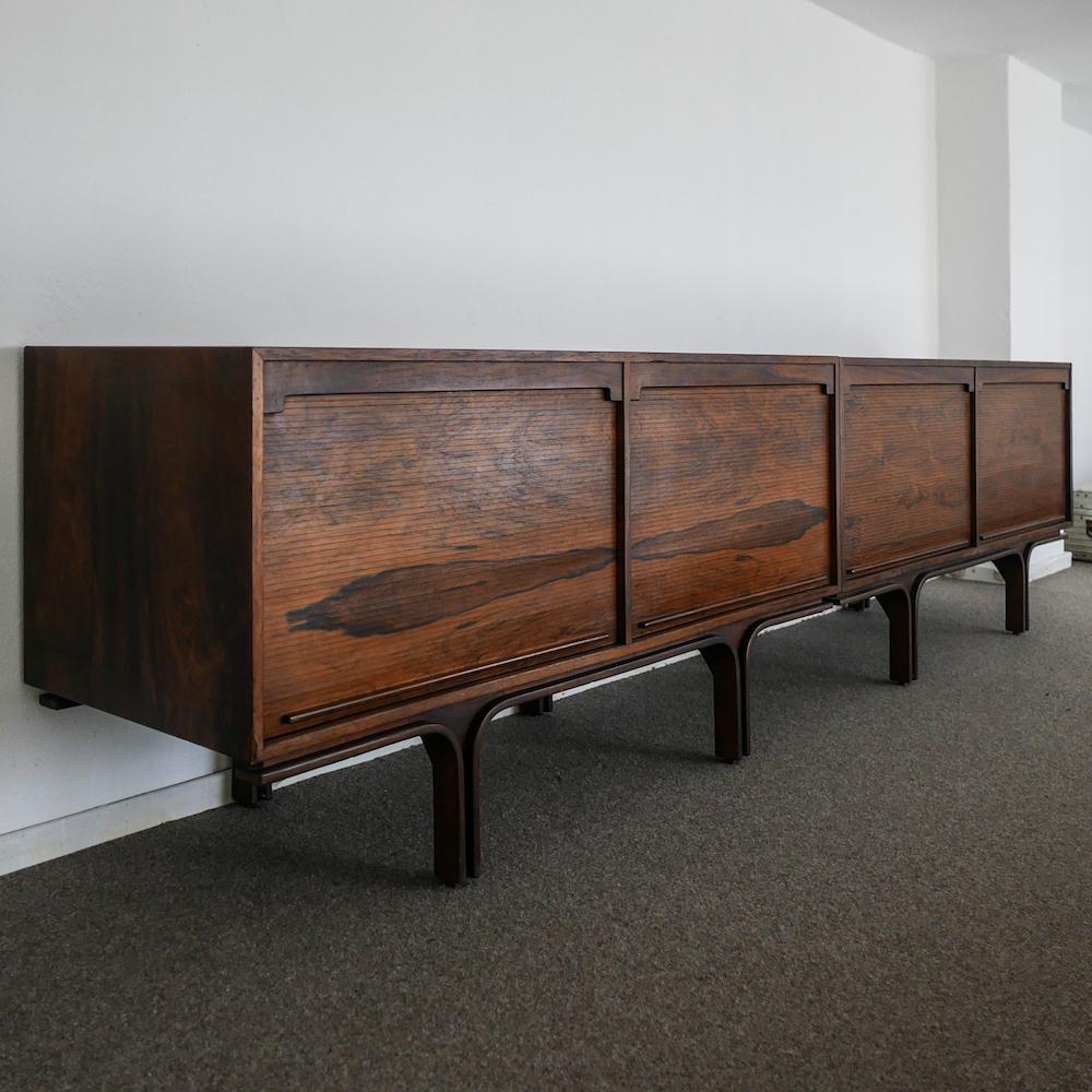 Gianfranco Frattini, born in Milano in 1926, has been one of the founders of the modern design movement in Italy. Spanning over more than five decades, his production accounts for tables, chairs, lounge chairs and many more pieces of furniture