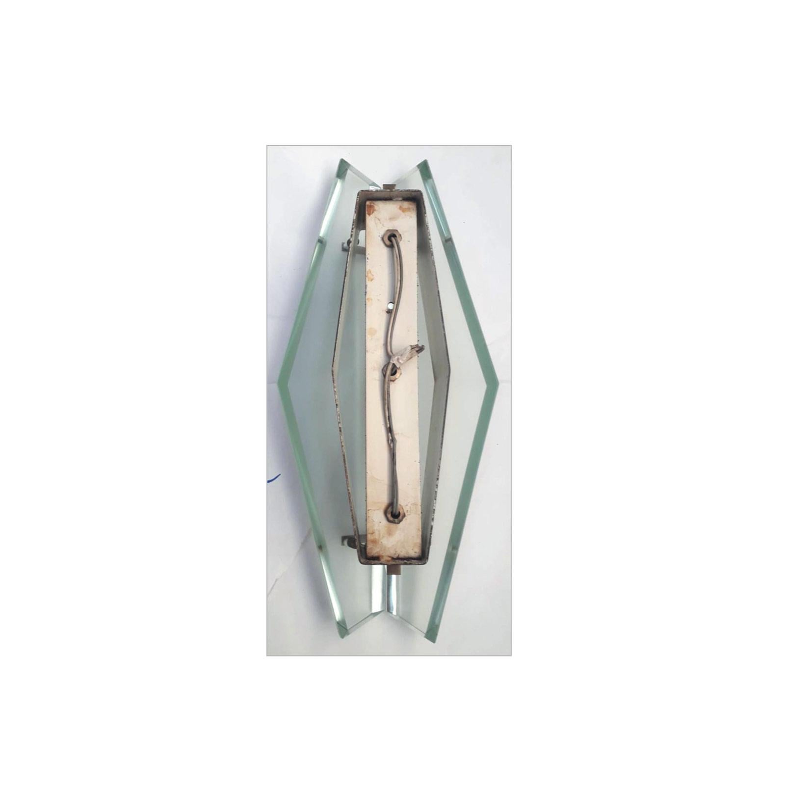 Pair of Vintage Italian beveled glass and sconces designed by Max Ingrand and manufactured by Fontana Arte, model 1943, circa 1960s, made in Milan, Italy.