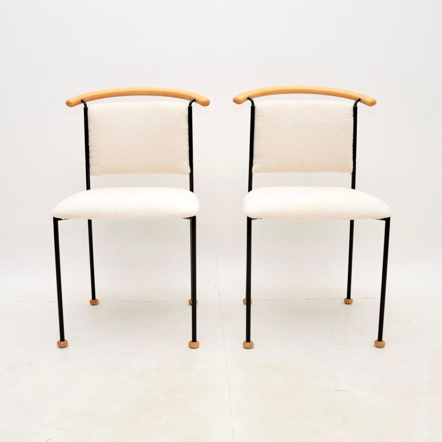 A very interesting and stylish pair of vintage Italian side chairs. They were made in Italy and date from the 1970-80’s.

They are of superb quality, with a quirky and quite unusual design. The black steel frames have curved wood back rests and sit