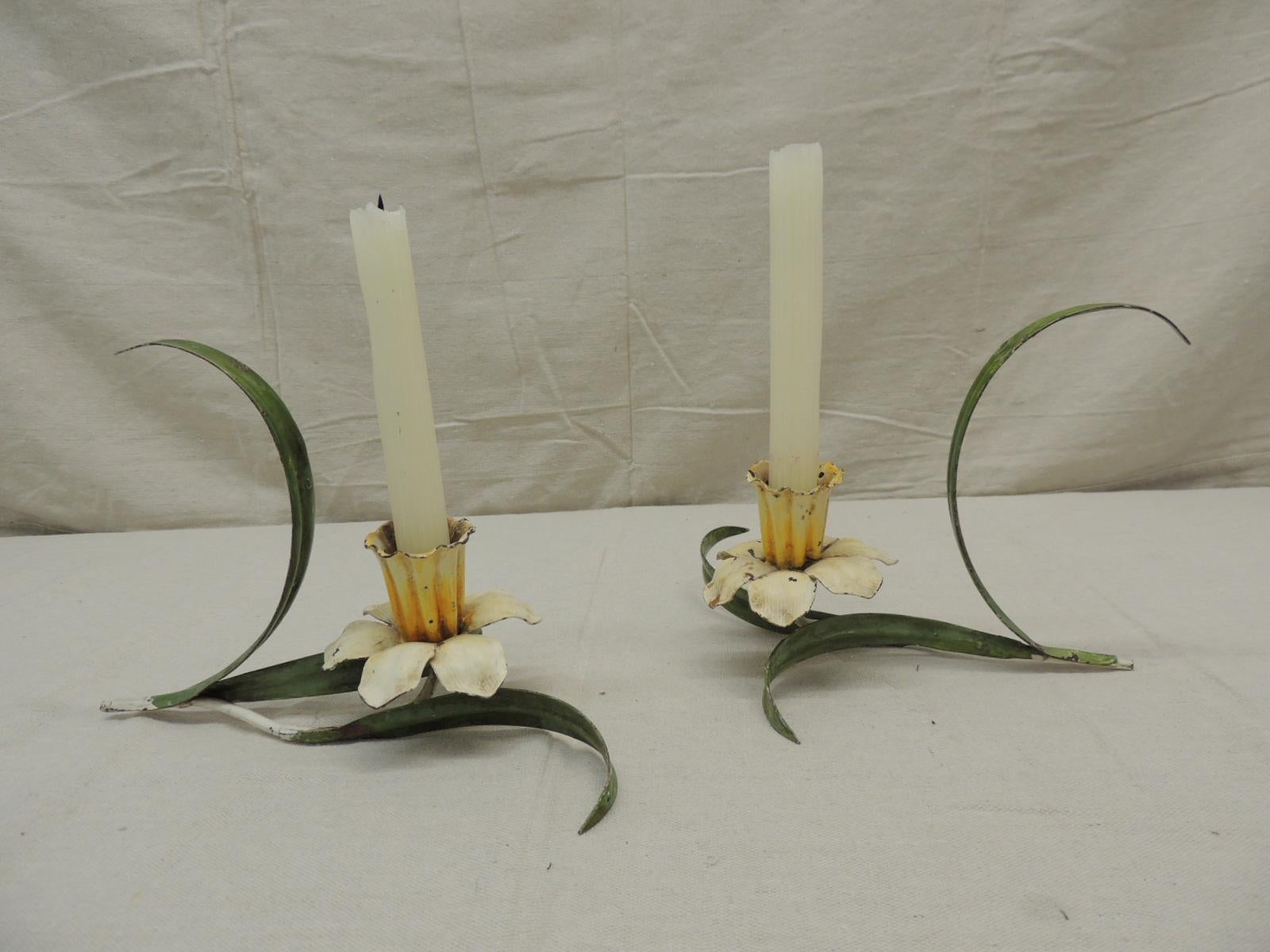 Pair of vintage Italian Tole candleholders
Metal hand painted tulips, yellow and green leaves
Size: 10” L x 7” H x 7.5” D.
 