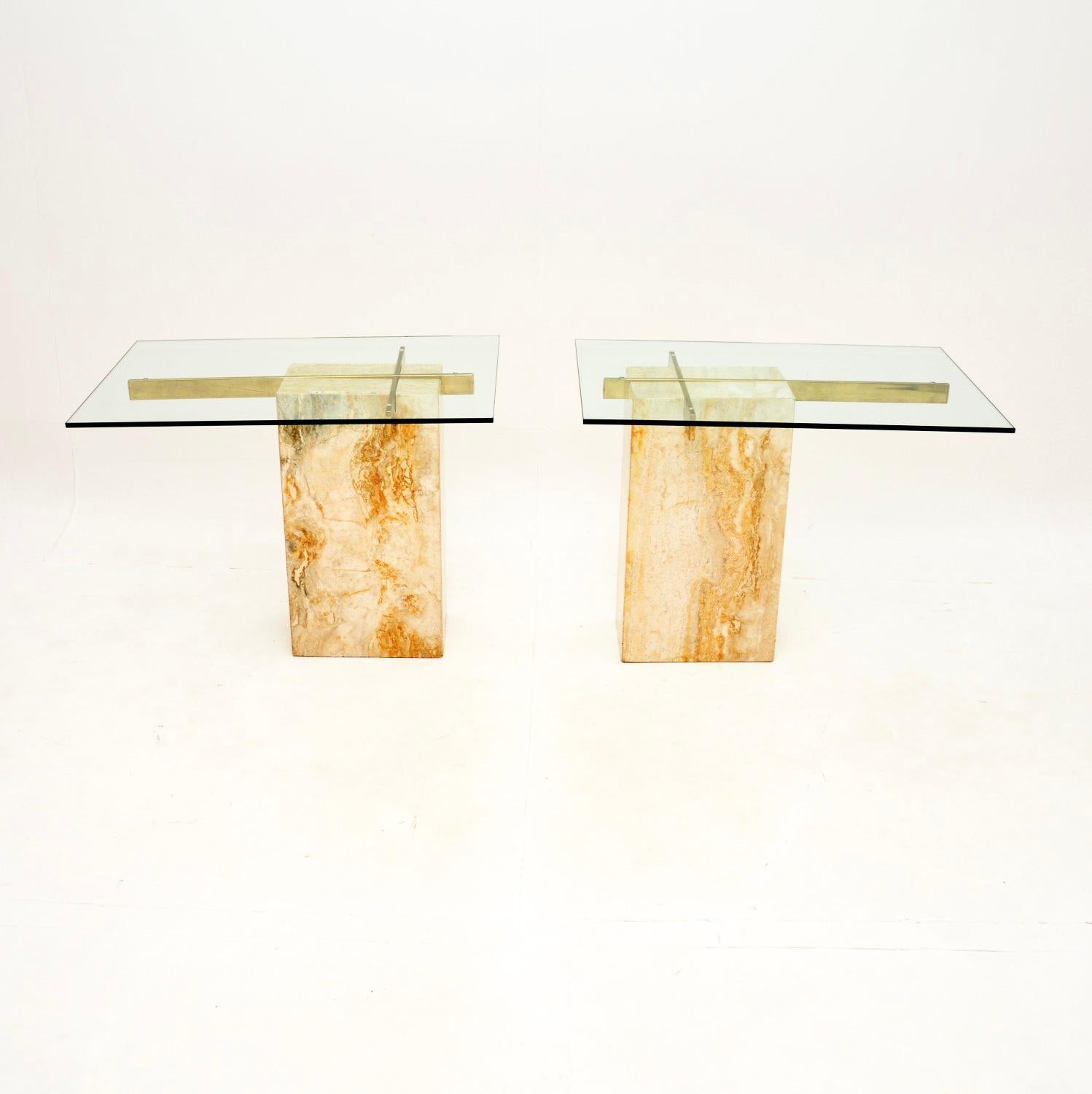 A stunning pair of vintage Italian travertine and brass side tables by Artedi. They were made in Italy, they date from the 1970’s.

The quality is exceptional and this is a very rare model. They are a useful size, perfect as end tables and have