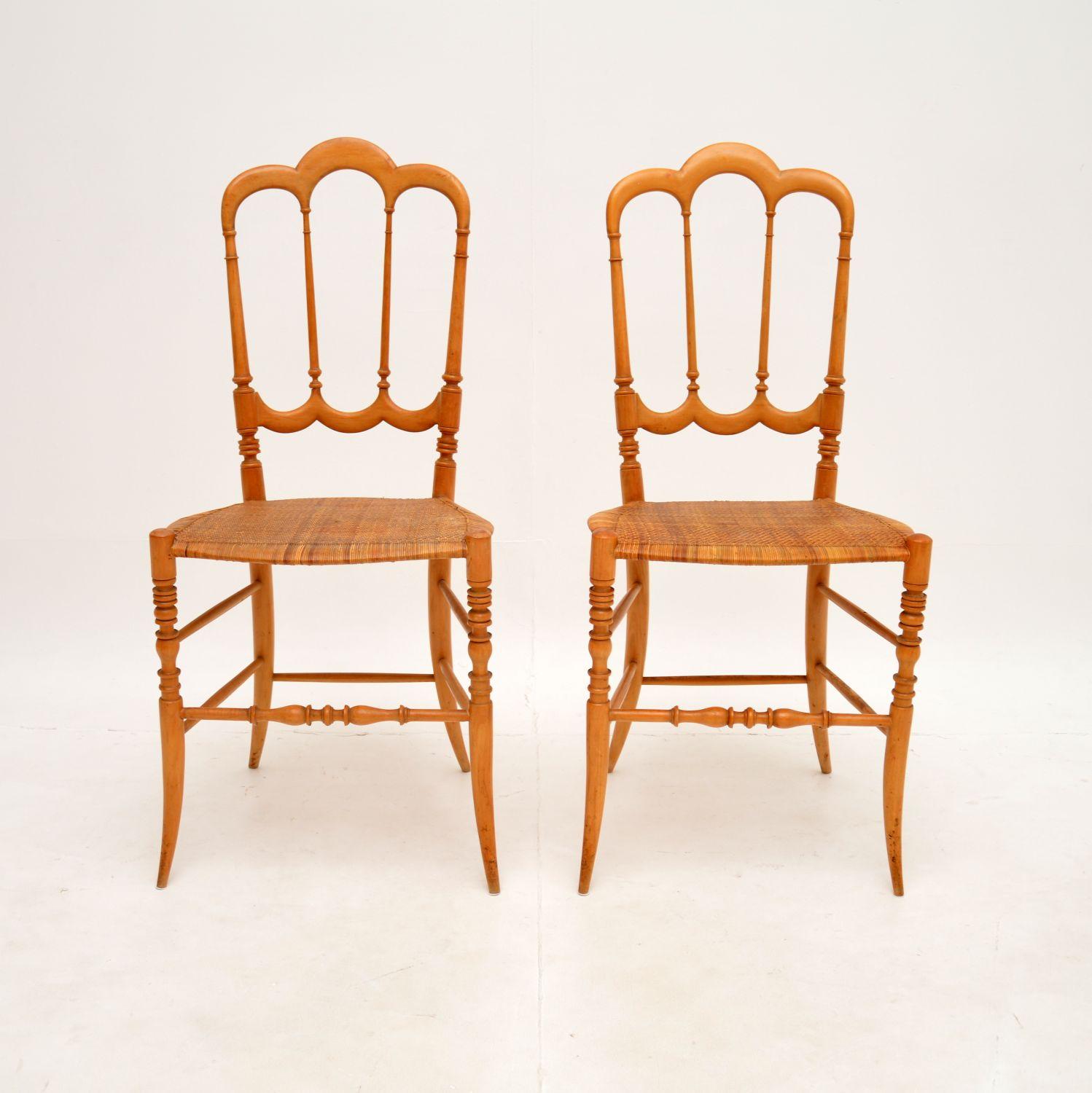 A stunning pair of vintage Italian ‘Tre Archi’ Chiavari chairs by Fratelli Levaggi. Each chair is stamped ‘made in Italy’ beneath the frames, they date from the 1960’s.

They are made from solid ligurian wood, with woven rattan seats. The design is