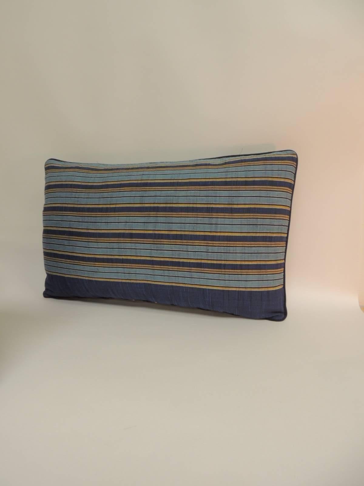 Pair of vintage Japanese blue and gold obi stripes decorative lumbar pillows. The textiles in these decorative pillows are woven silk. Throw pillows embellished with a small decorative black trim all around. Decorative pillows finished with deep