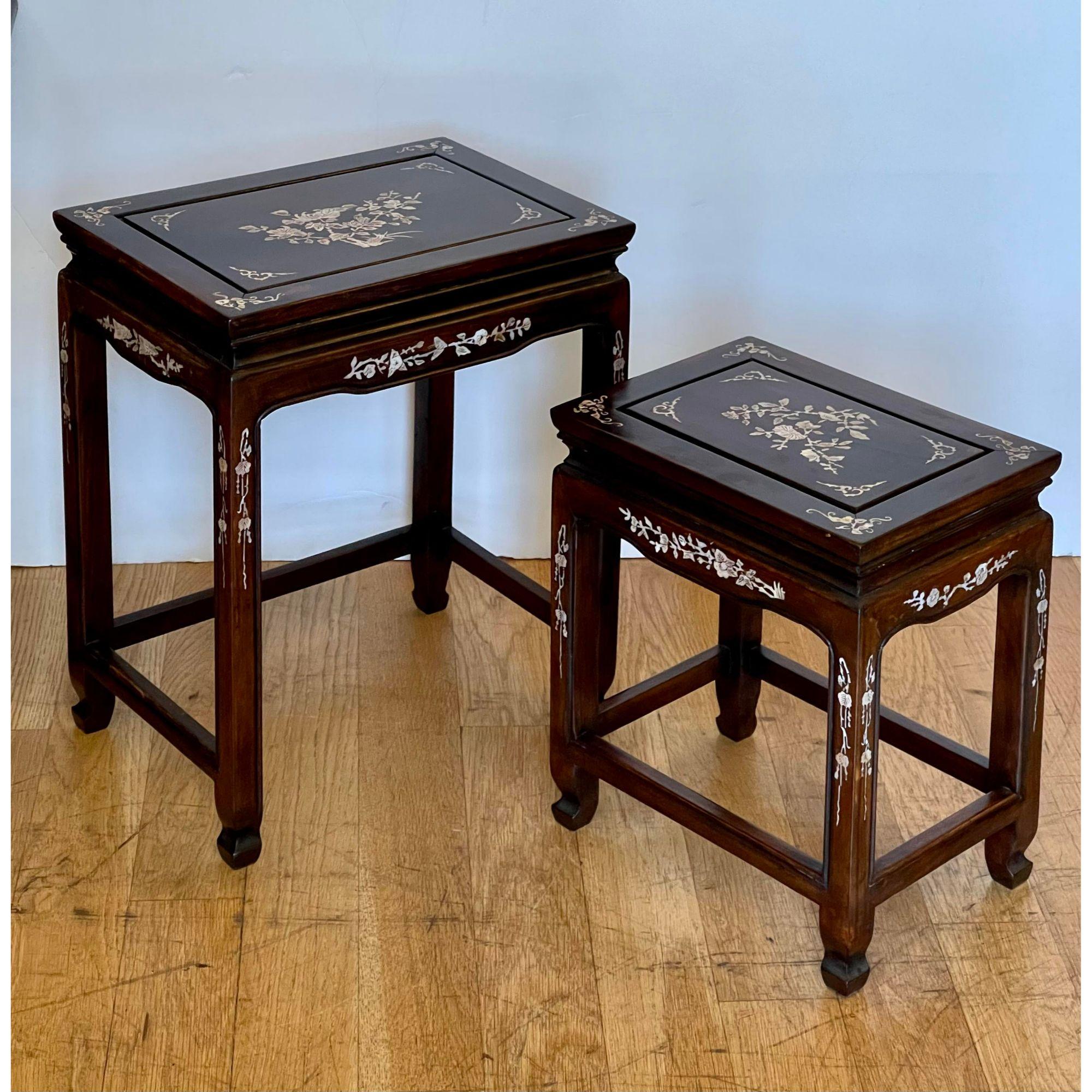 Vintage Japanese Mother Of Pearl Inlaid Rosewood Nesting Tables. This item includes restricted materials and can not be sold outside of the contiguous United States

Additional information: 
Materials: Mother-of-Pearl, Rosewood
Color: