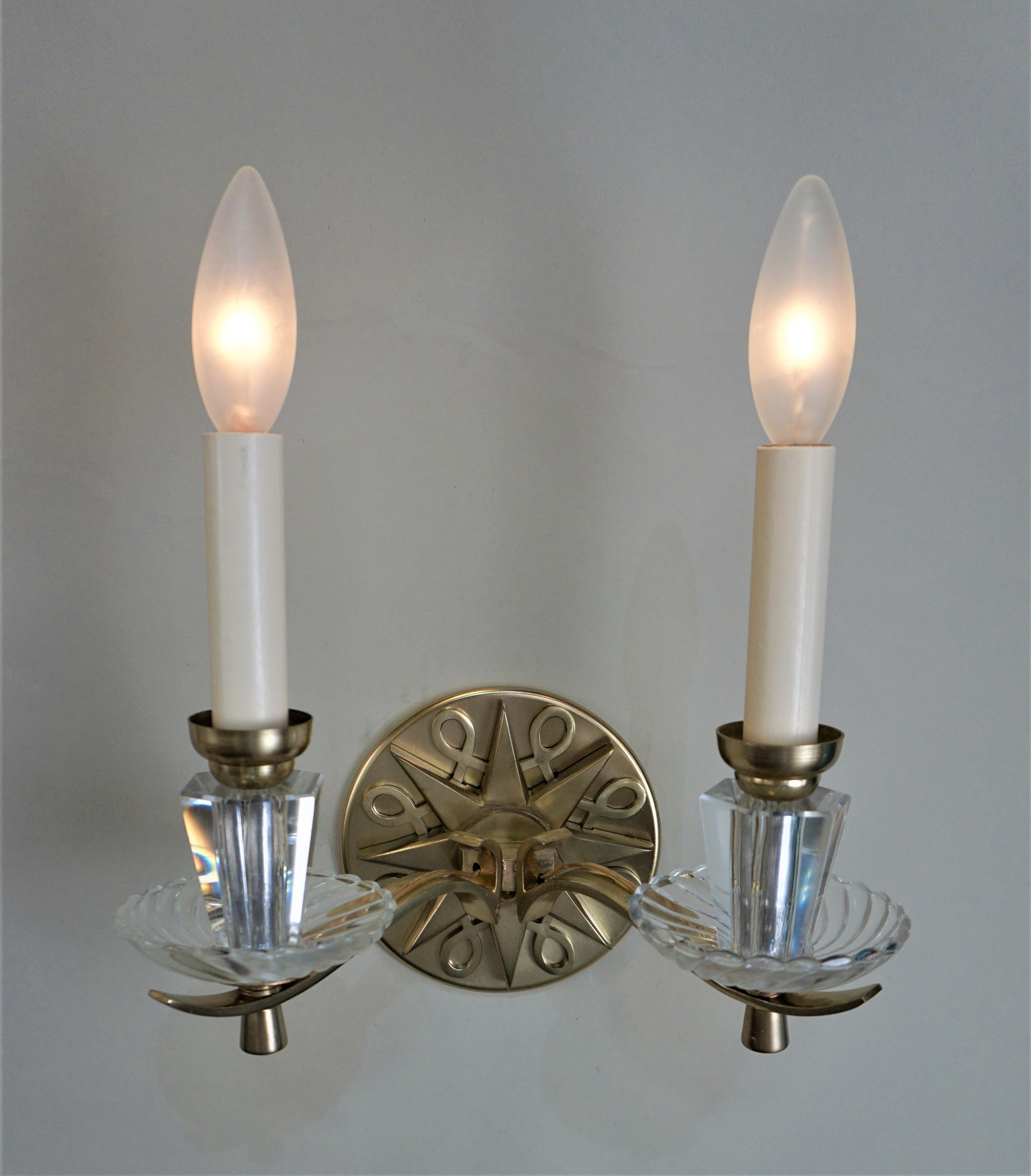 Pair of double arm 1950s bronze wall sconces.