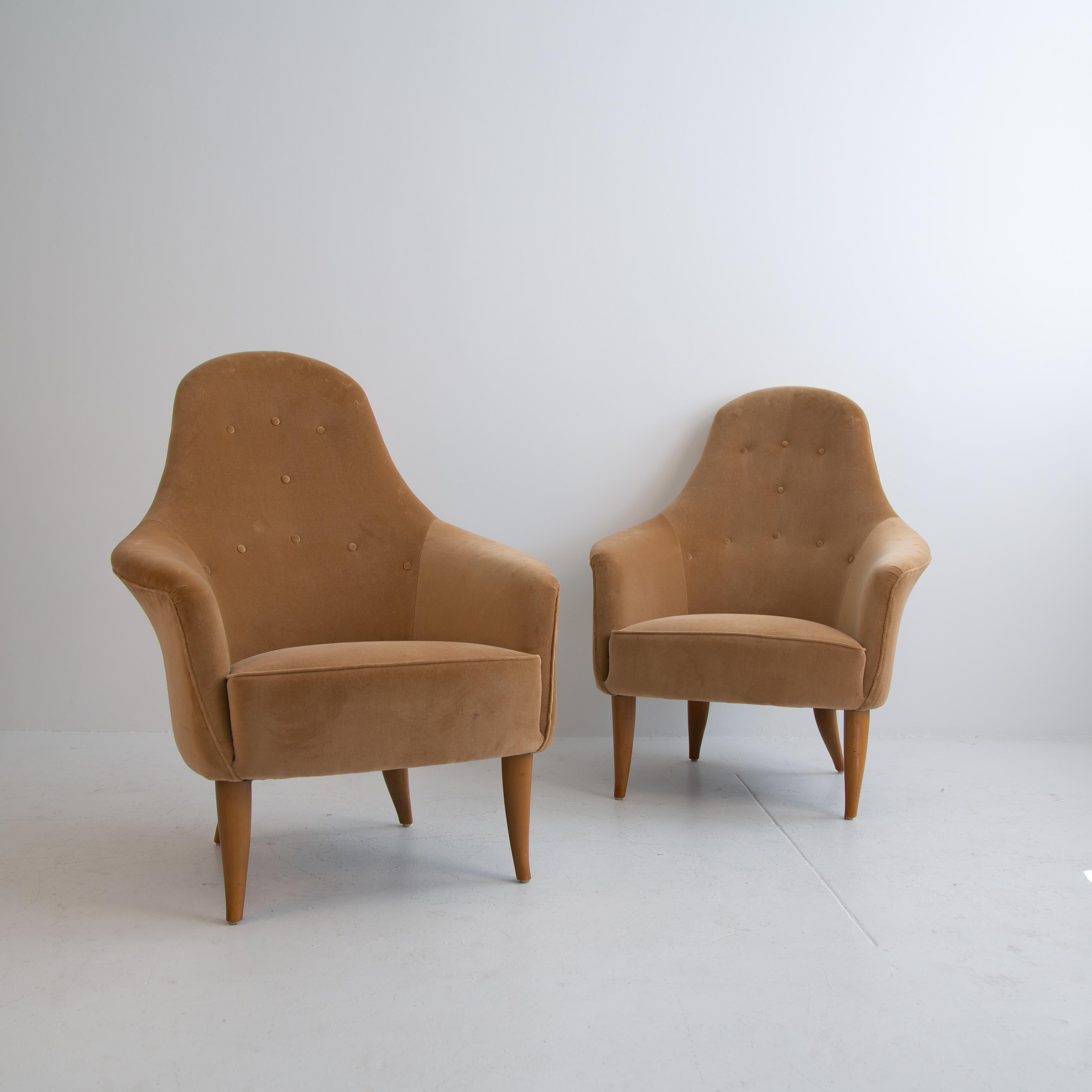 Set of two chairs by Kerstin Horlin Holmquist chairs from the Paradiset collection for Nordiska Kompaniet. Fully refinished and reupholstered in tan velvet. The velvet chairs would provide the perfect amount of luxury to a seating vignette area or