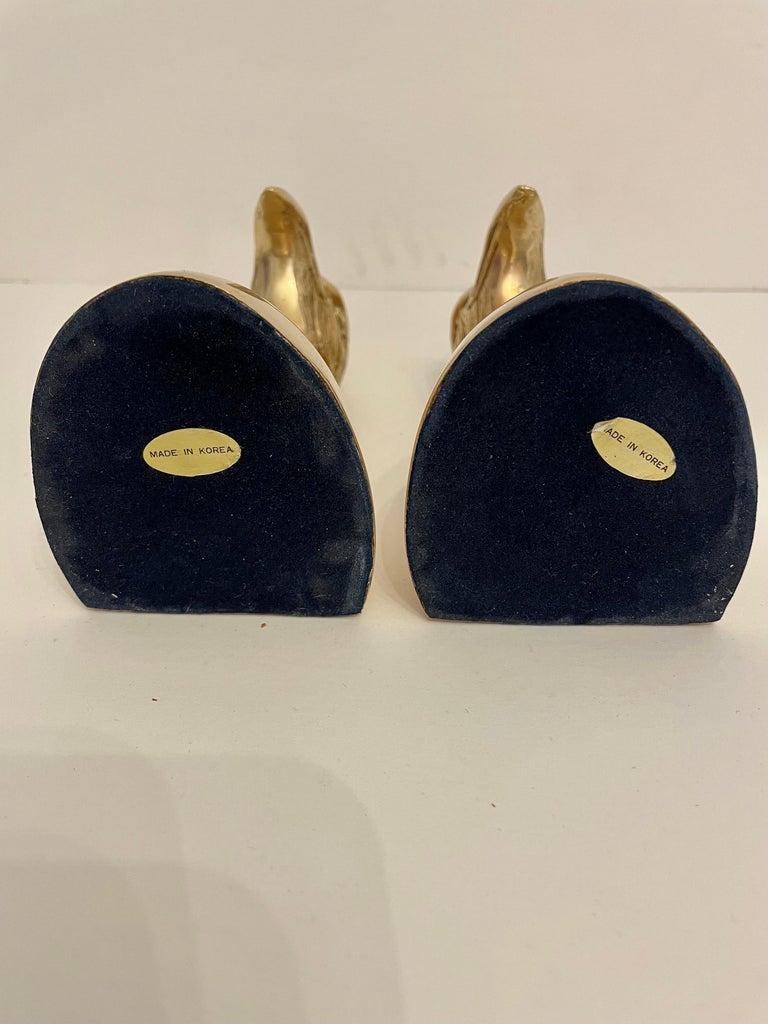 Nice set of heavy regal brass Eagle bookends. Has thin felt on bottom of each to prevent scratching furniture. Great on a book shelf or desk. Nice condition, hand polished, ready to use. 6.5” tall 3.25 deep x 3.25” wide. Will hold a nice large stack