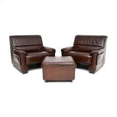 Pair of Vintage Leather Armchairs and Stool by De Sede