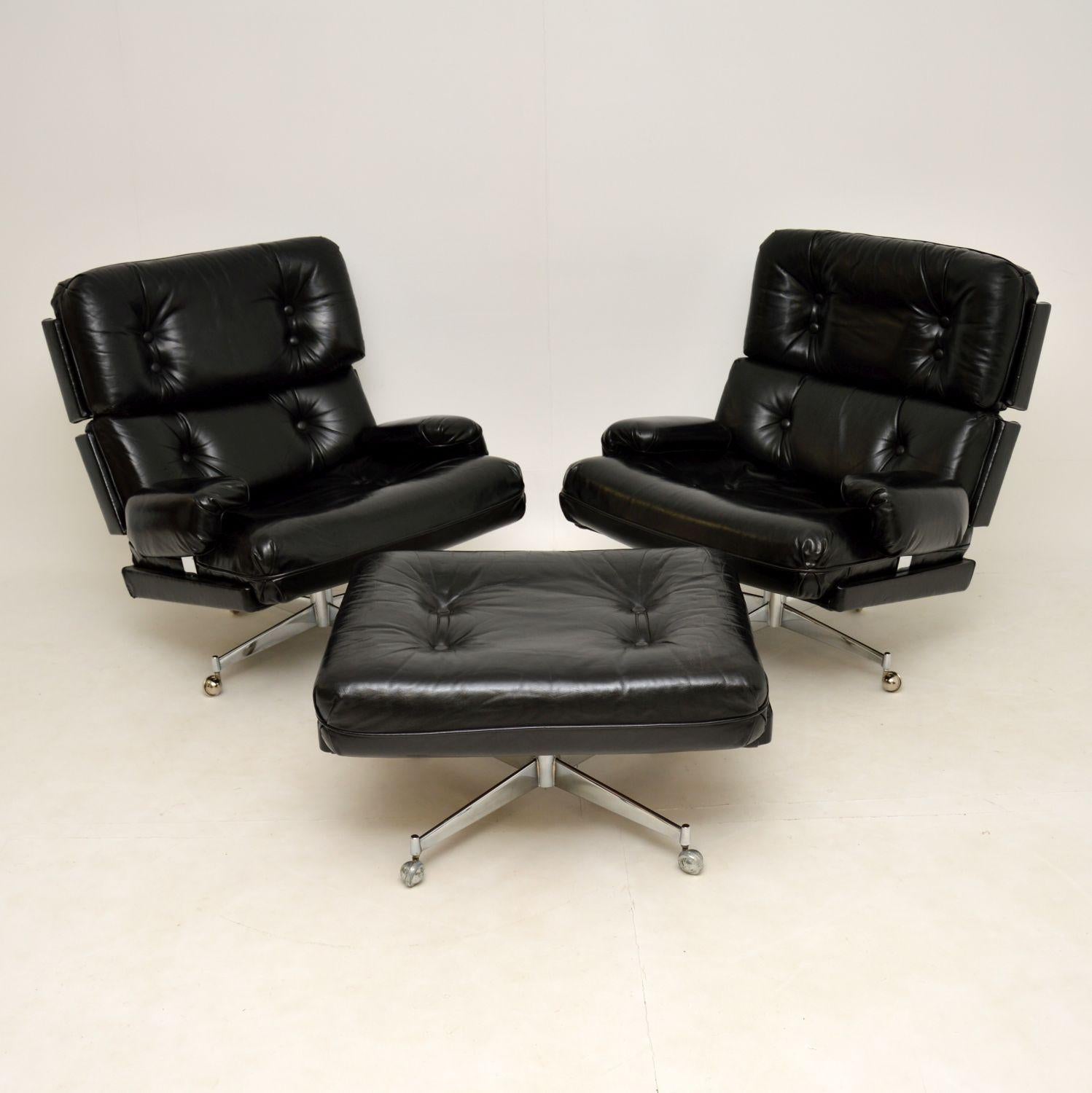 A magnificent pair of ‘Kohinoor’ swivel armchairs and matching stool in black leather and chrome. These were made by Howard Keith, they date from the 1960’s.

These are extremely comfortable, it’s very rare to find this model on casters and also