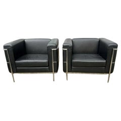 Pair of Used leather chrome frame lounge chairs style of Le Corbusier LC3