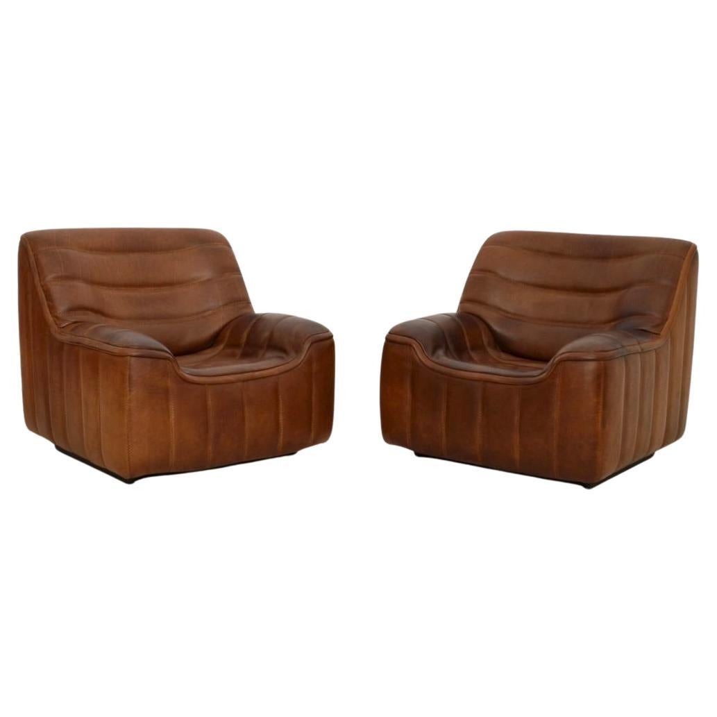 Coppia di poltrone DS 84 in pelle vintage di De Sede