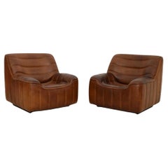 Coppia di poltrone DS 84 in pelle vintage di De Sede
