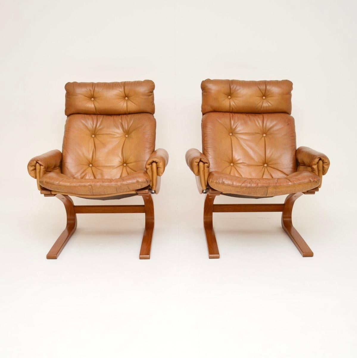 A stylish and extremely comfortable pair of vintage leather Kengu armchairs by Elsa and Nordahl Solheim for Rykken. They were made in Norway, they date from the 1970’s.

The quality is exceptional, they are beautifully designed and are really,