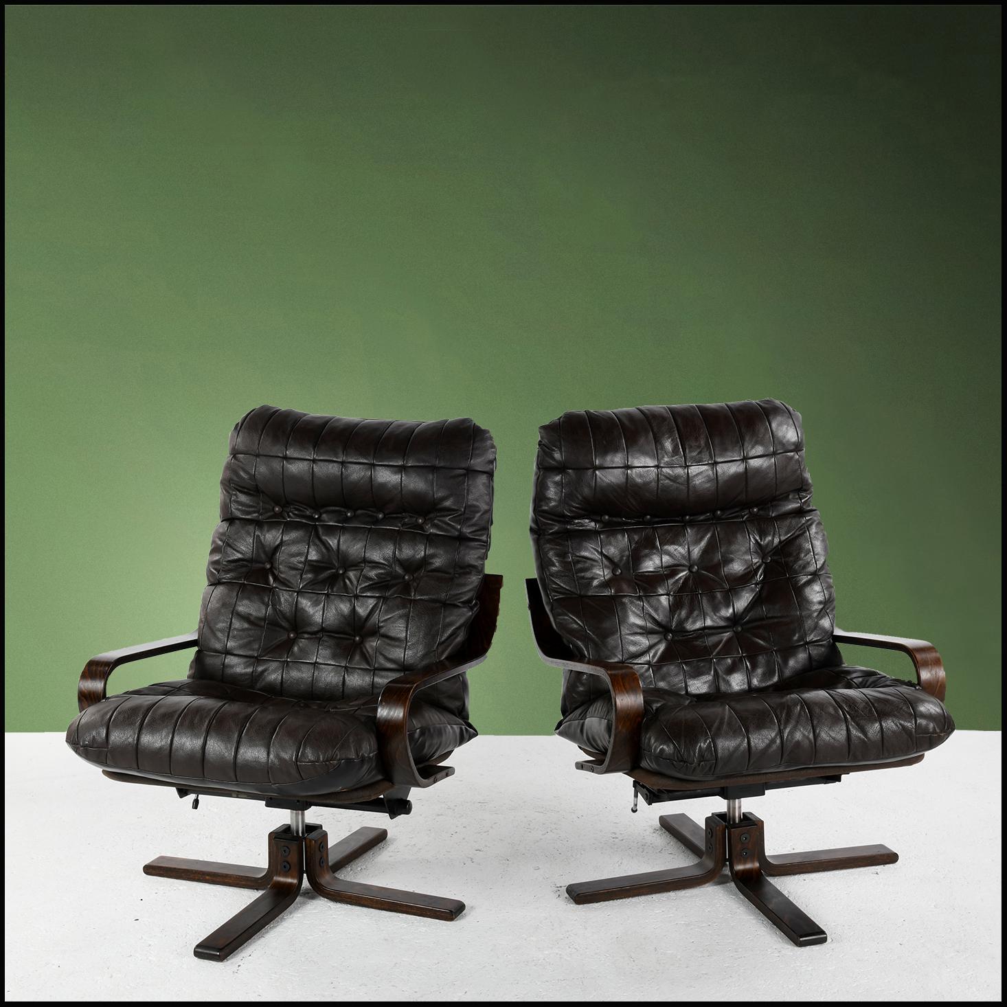 Pair of leather lounge chairs from the 1960s-70s, Scandinavian manufacture, mechanism marked 