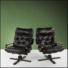 Pair of vintage leather lounge chairs