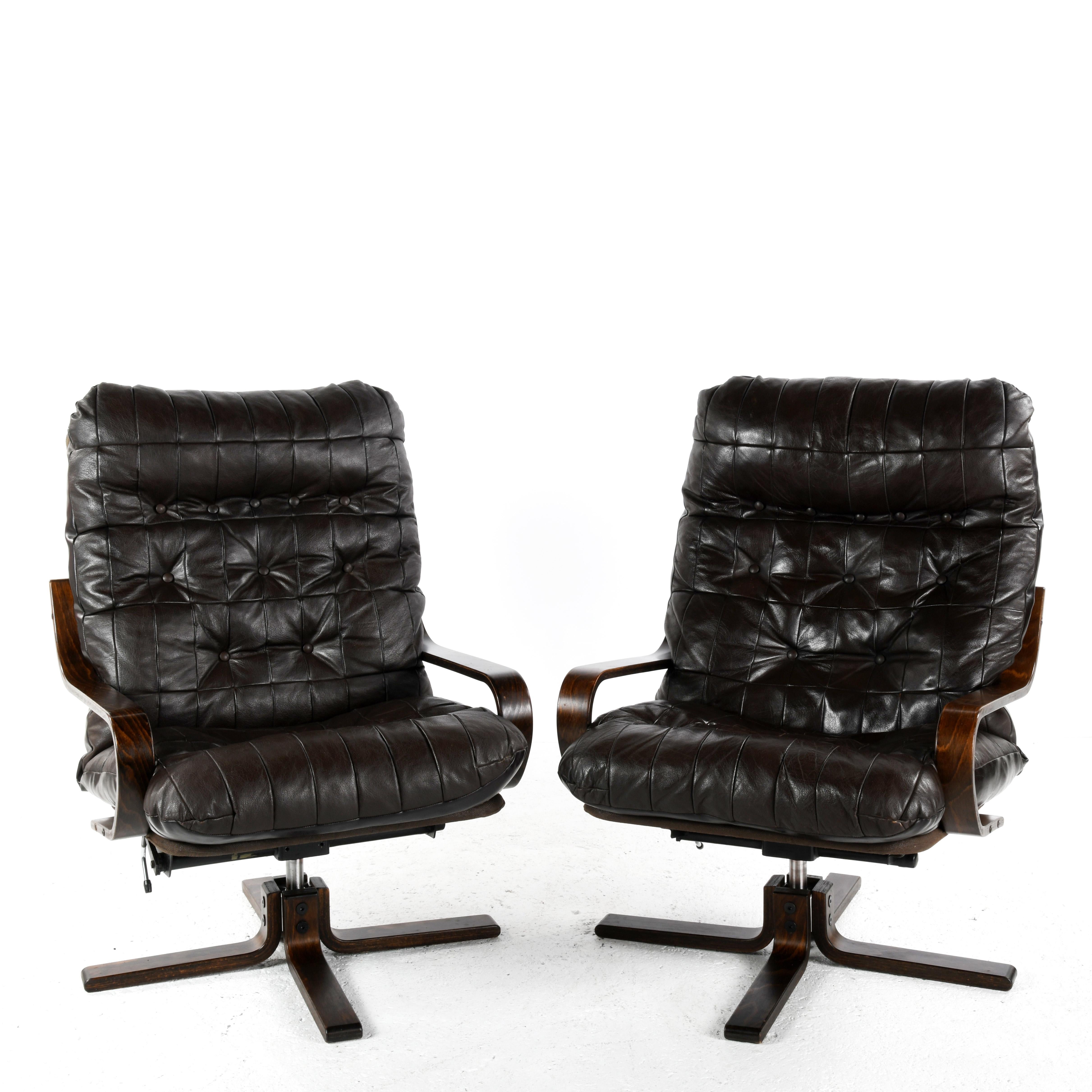 Mid-Century Modern Pair of vintage leather lounge chairs